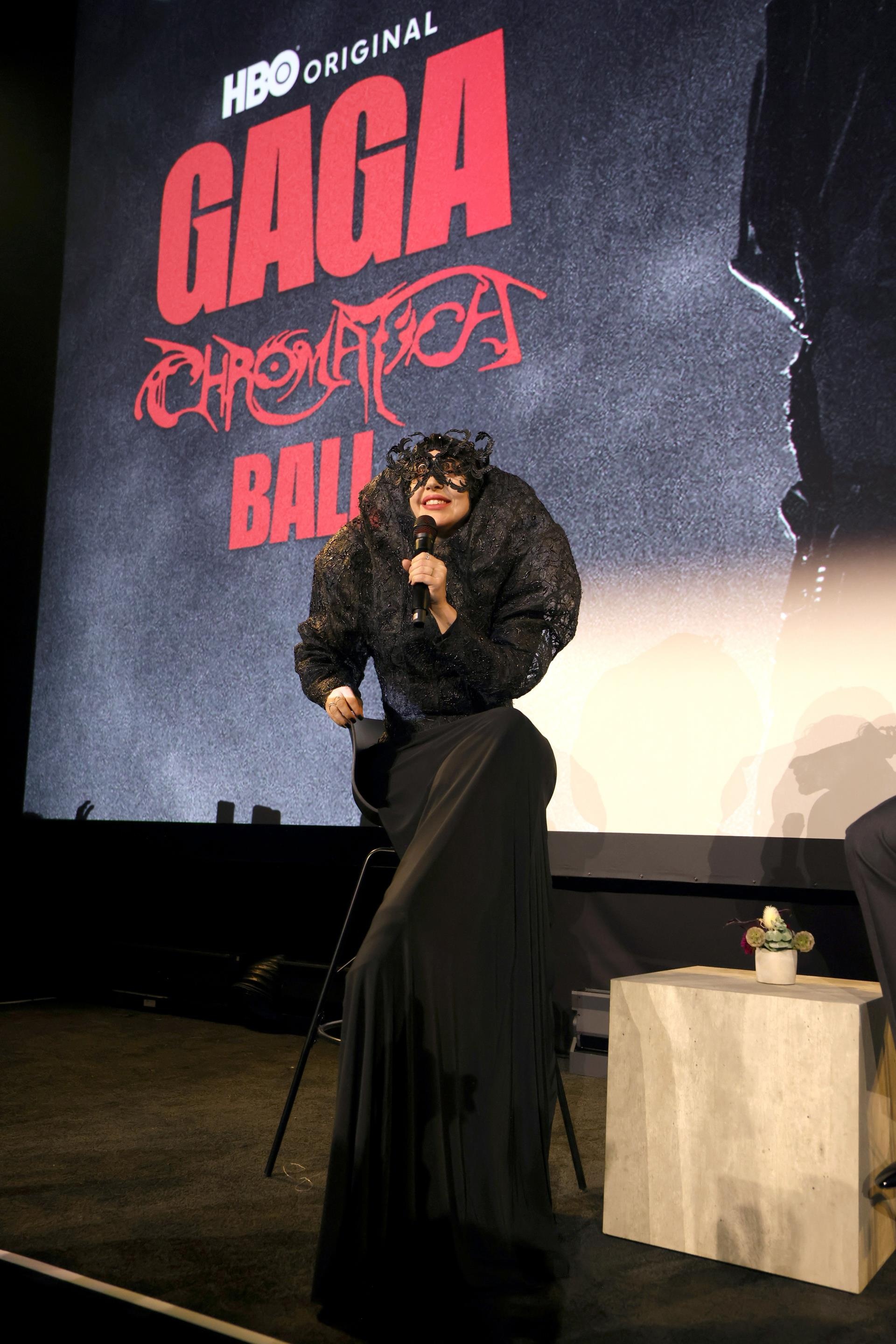 Lady Gaga wears an elaborate black dress the premiere of 