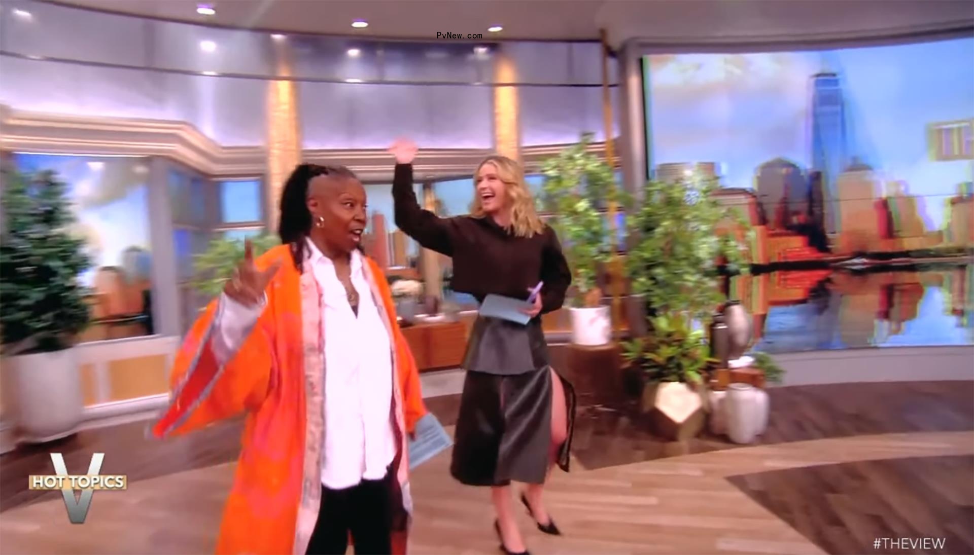 Whoopi Goldberg and Sara Haines walking on