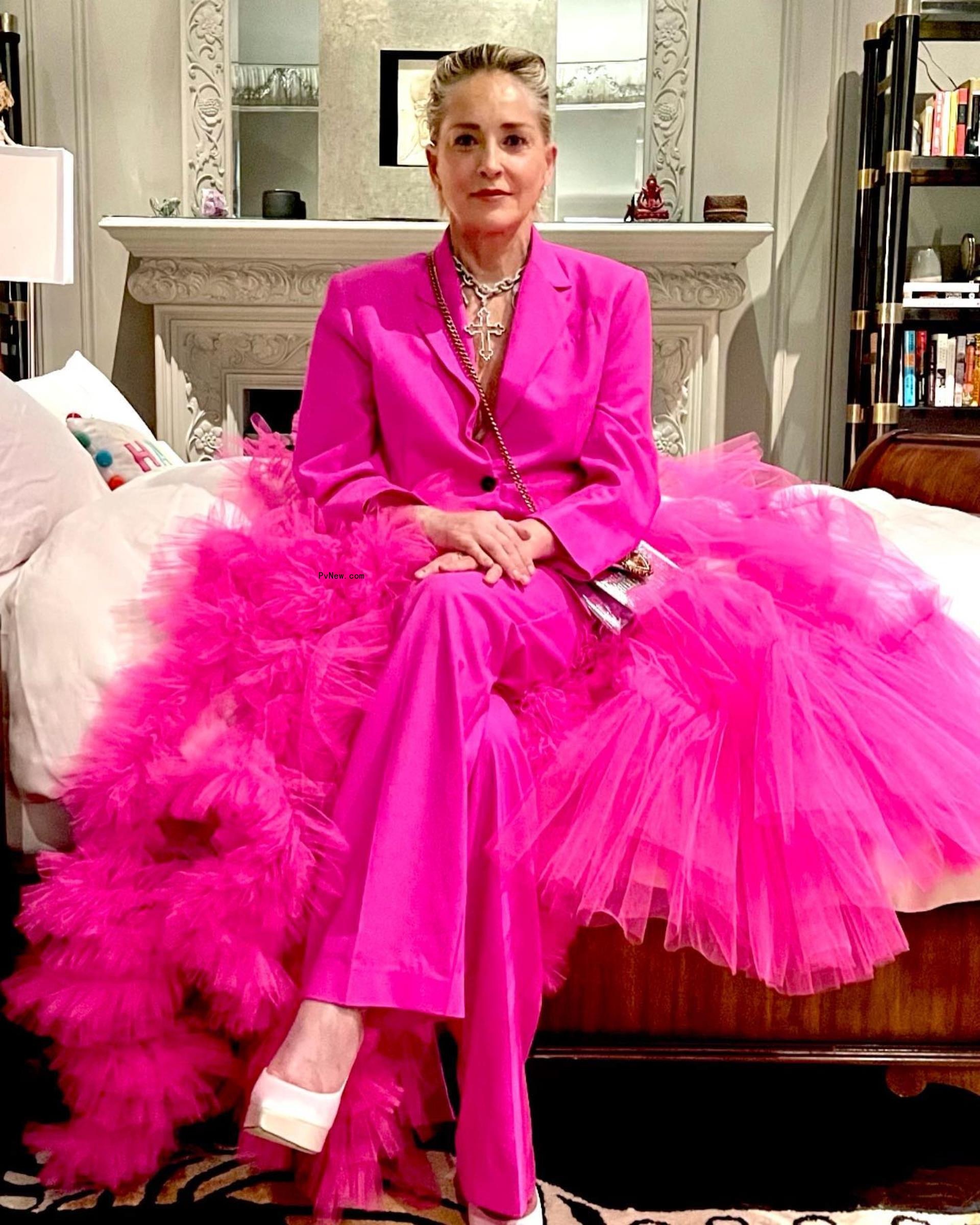 Sharon Stone in a pink outfit. 
