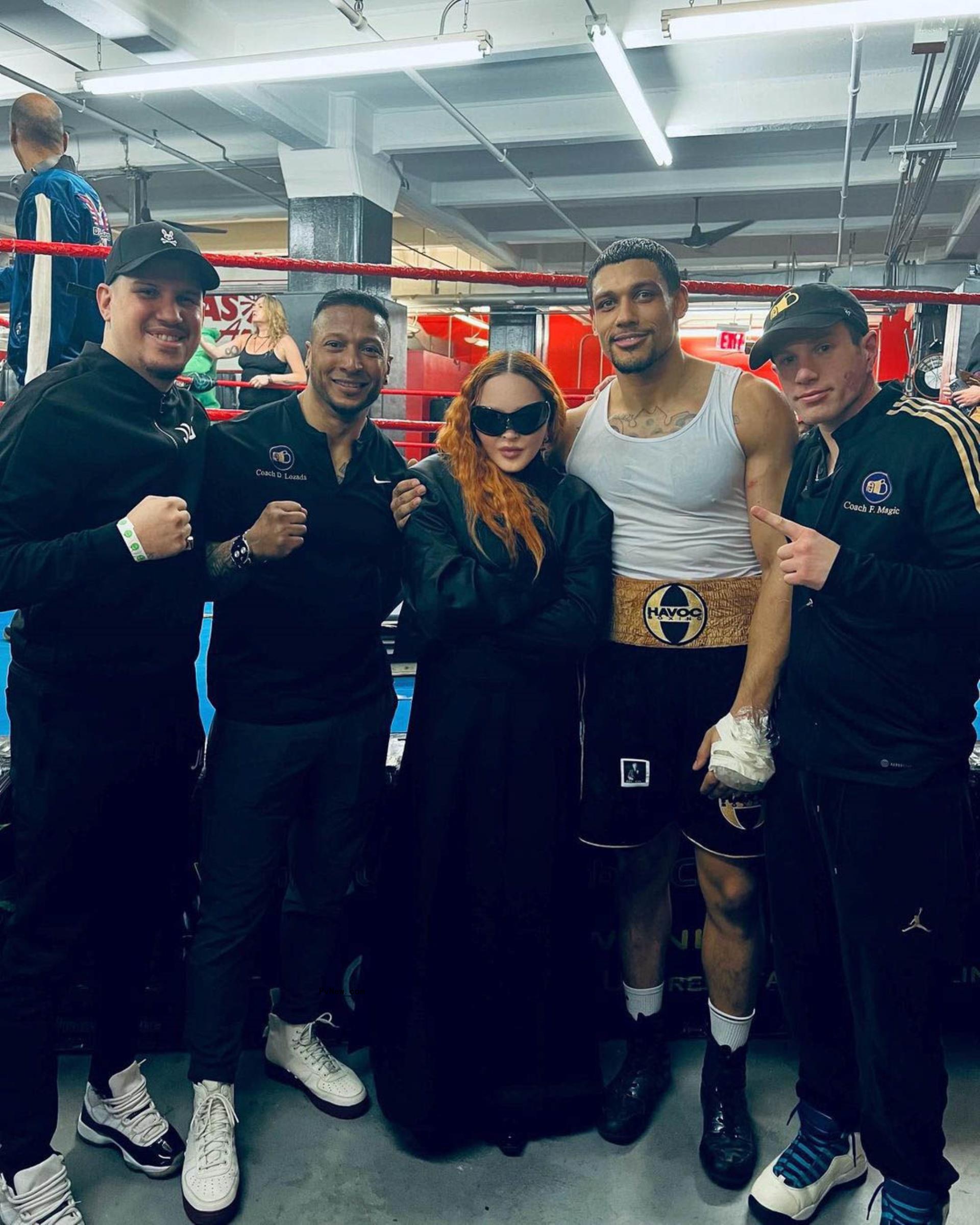 Josh Popper and Mado<i></i>nna and other people after his fight.