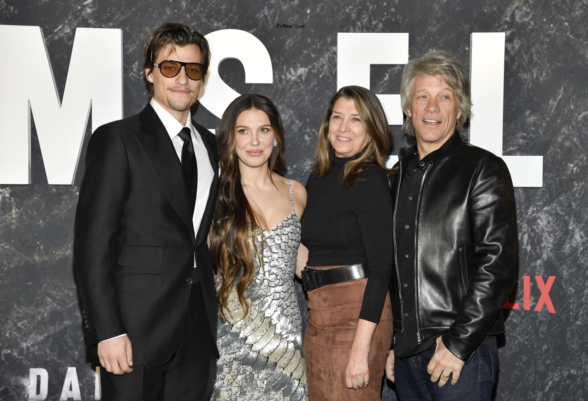 Millie Bobby Brown with Jake Bo<i></i>ngiovi with Jon Bon Jovi.