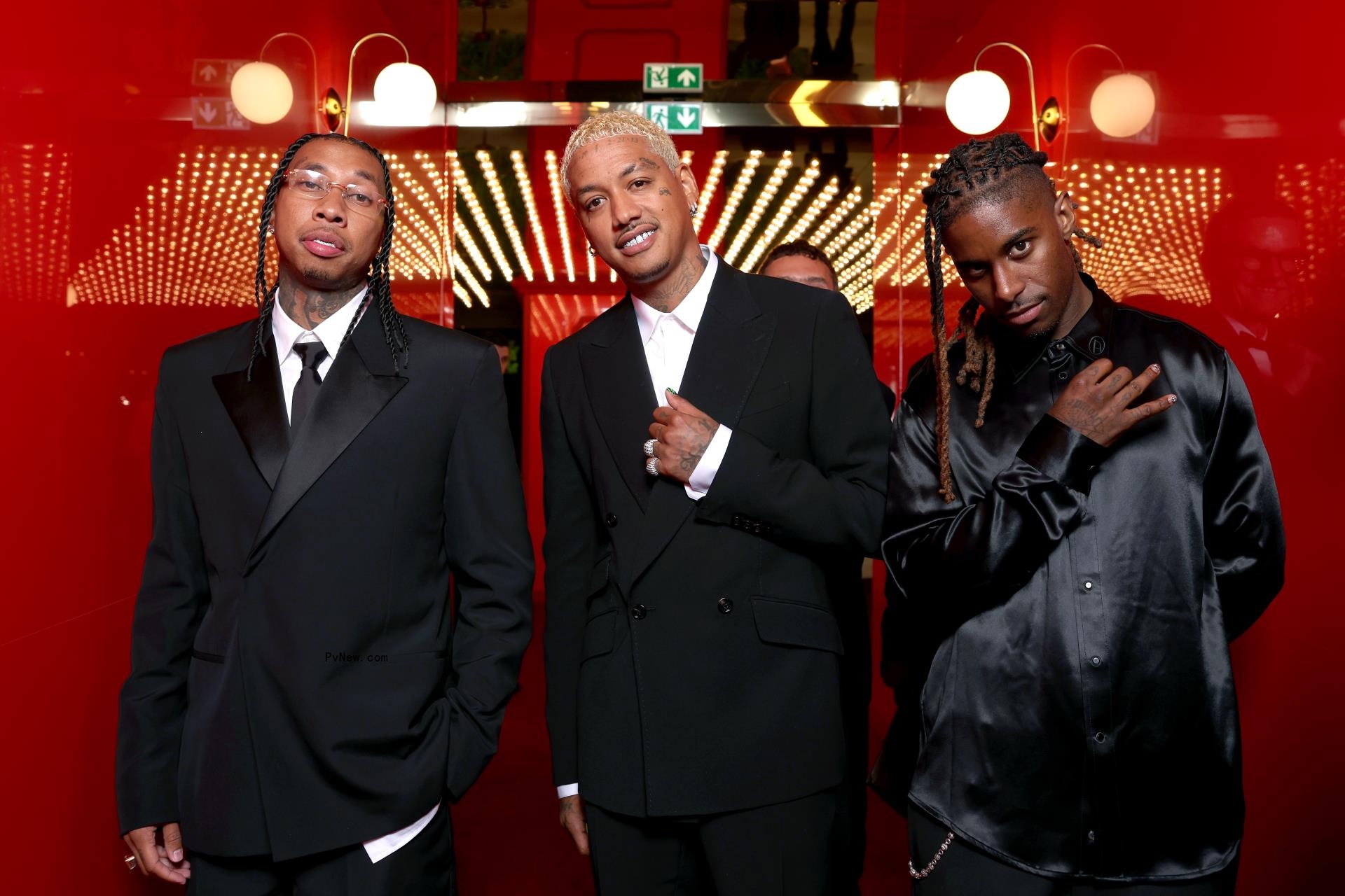 Tyga, Alexander Edwards and a guest attend the amfAR Cannes Gala 30th edition.
