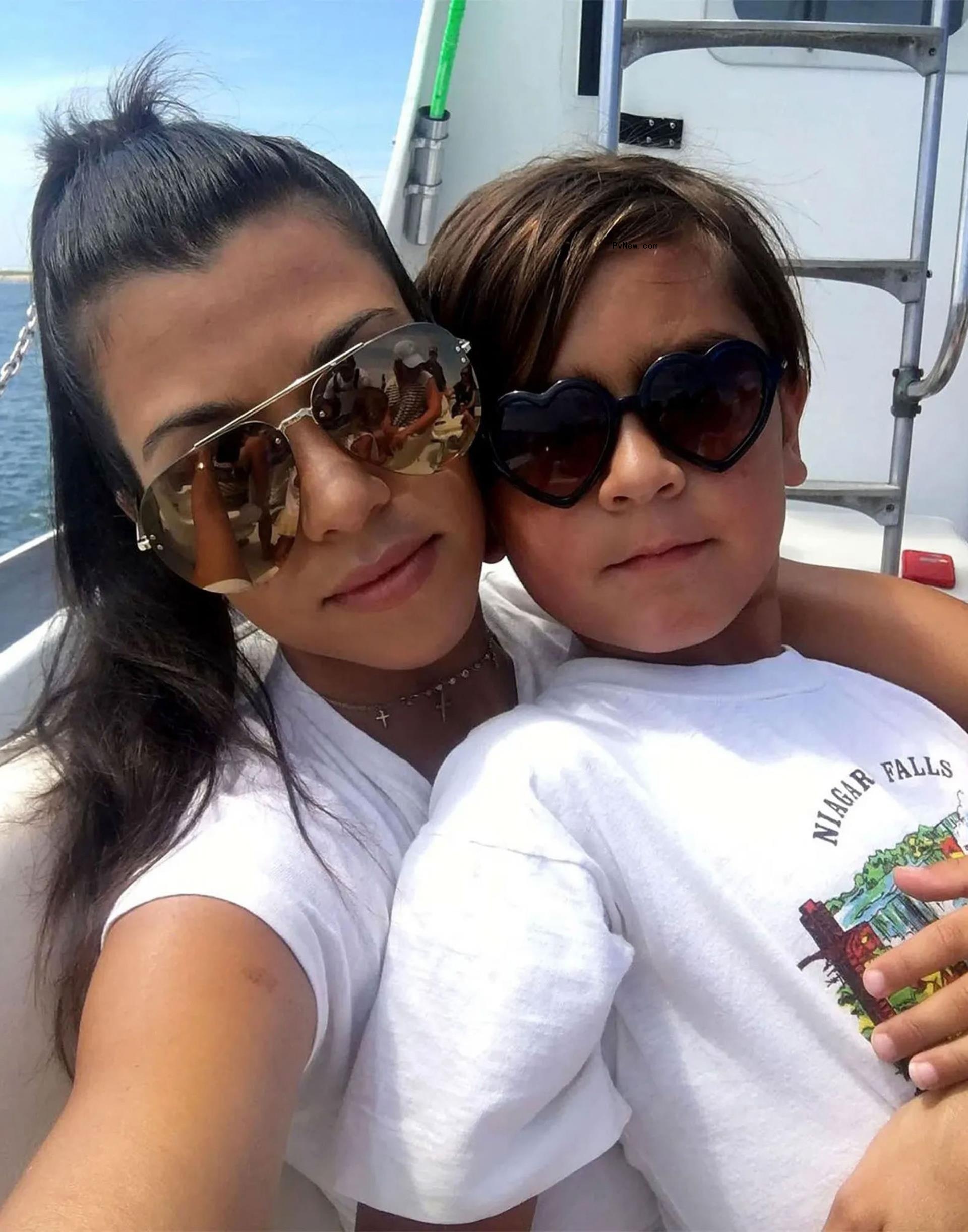 Kourtney Kardashian and Mason Disick.