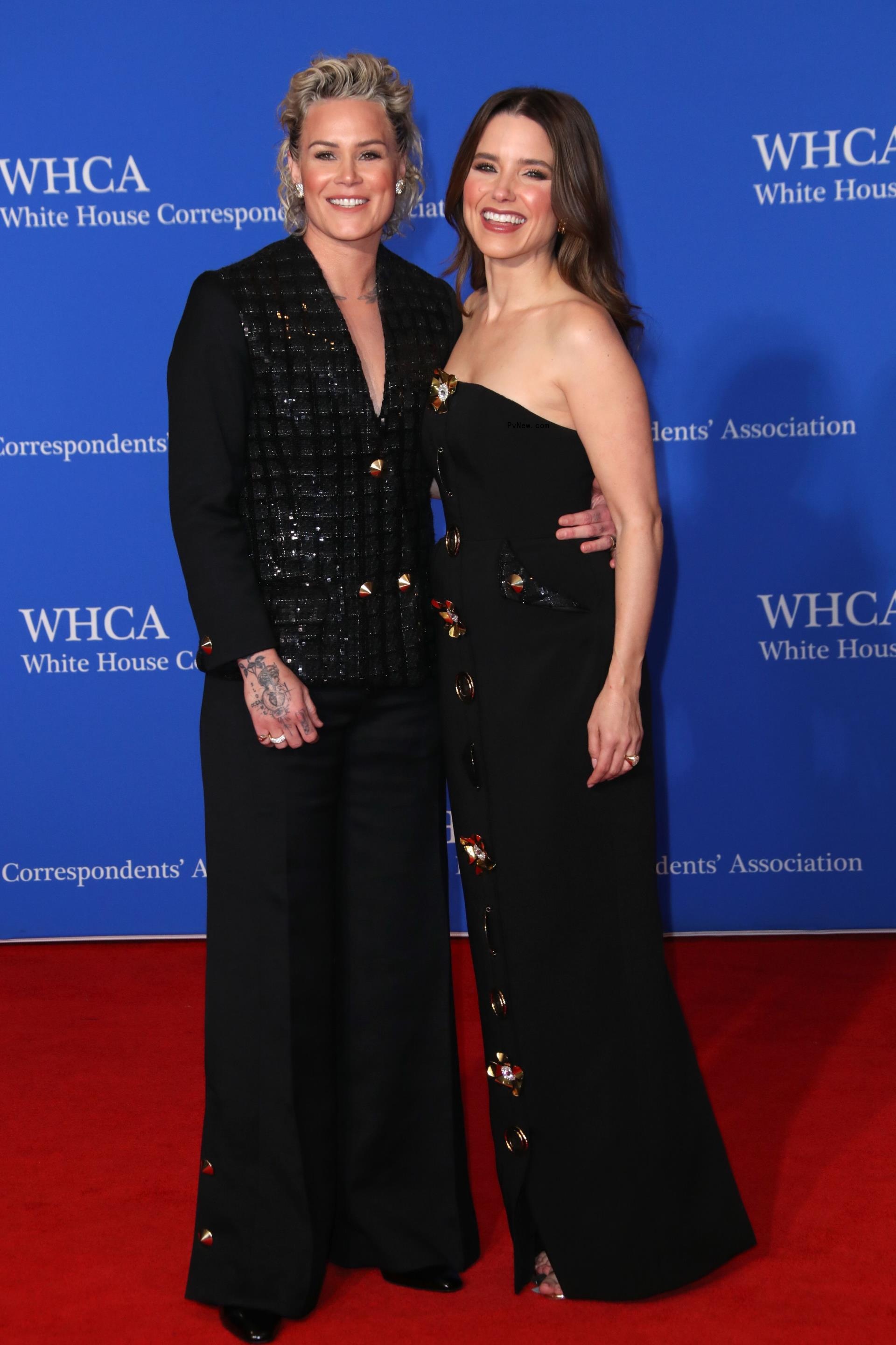Sophia Bush poses with Ashlyn Harris on red carpet