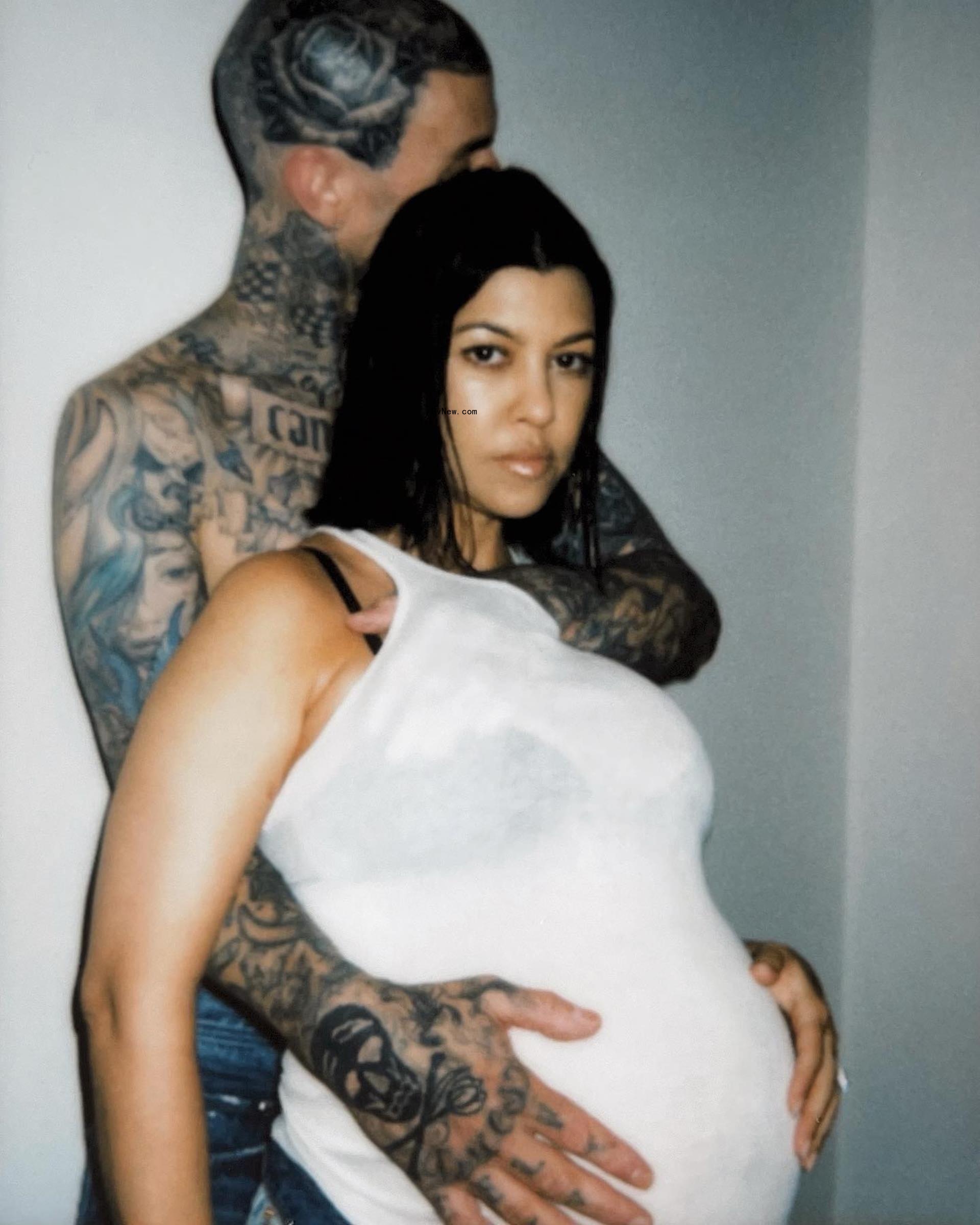 Pregnant Kourtney Kardashian and Travis Barker