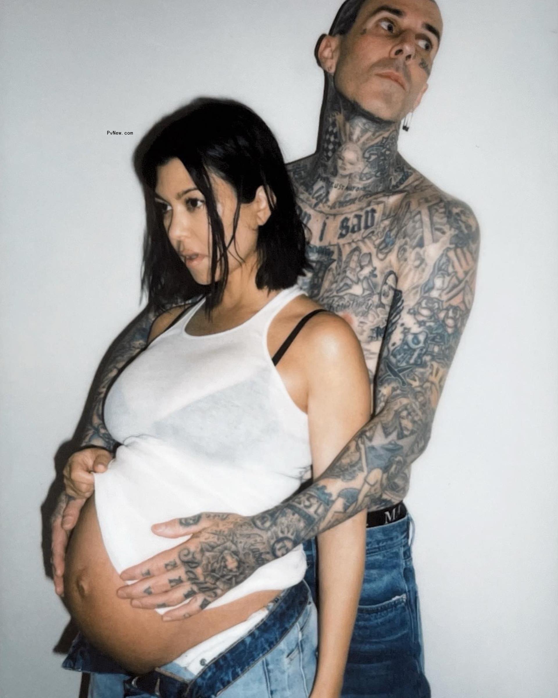 Pregnant Kourtney Kardashian and Travis Barker
