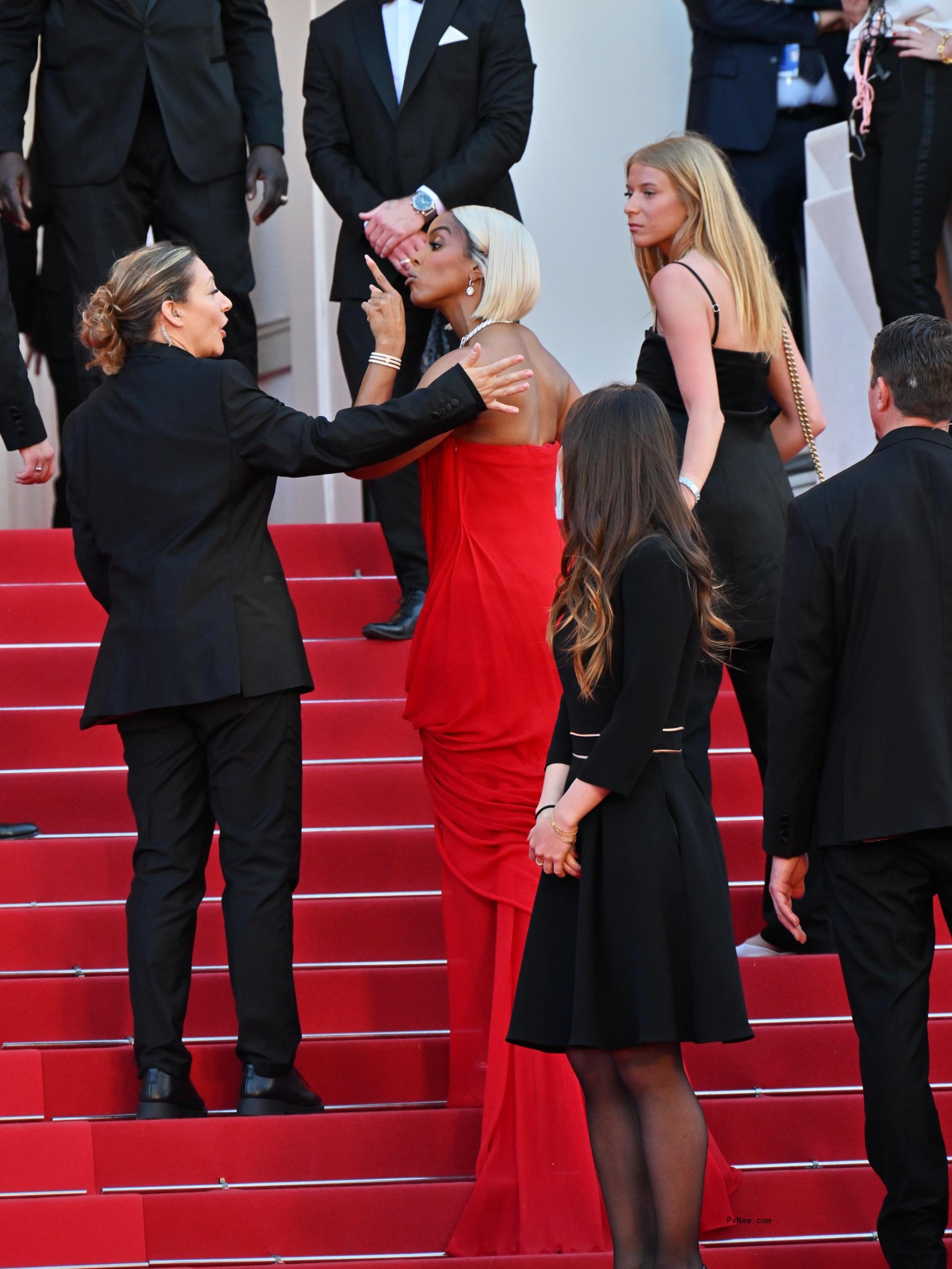 Kelly Rowland scolding a security guard at the Cannes Film Festival