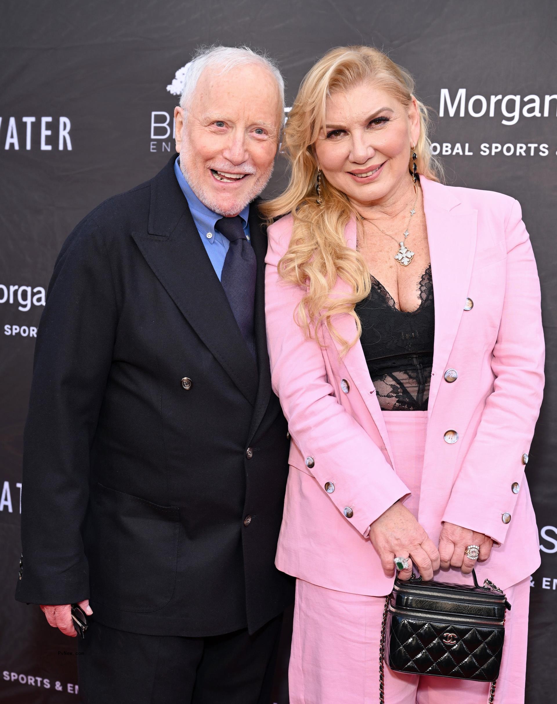 Richard Dreyfuss and Svetlana Erokhin posing on a carpet