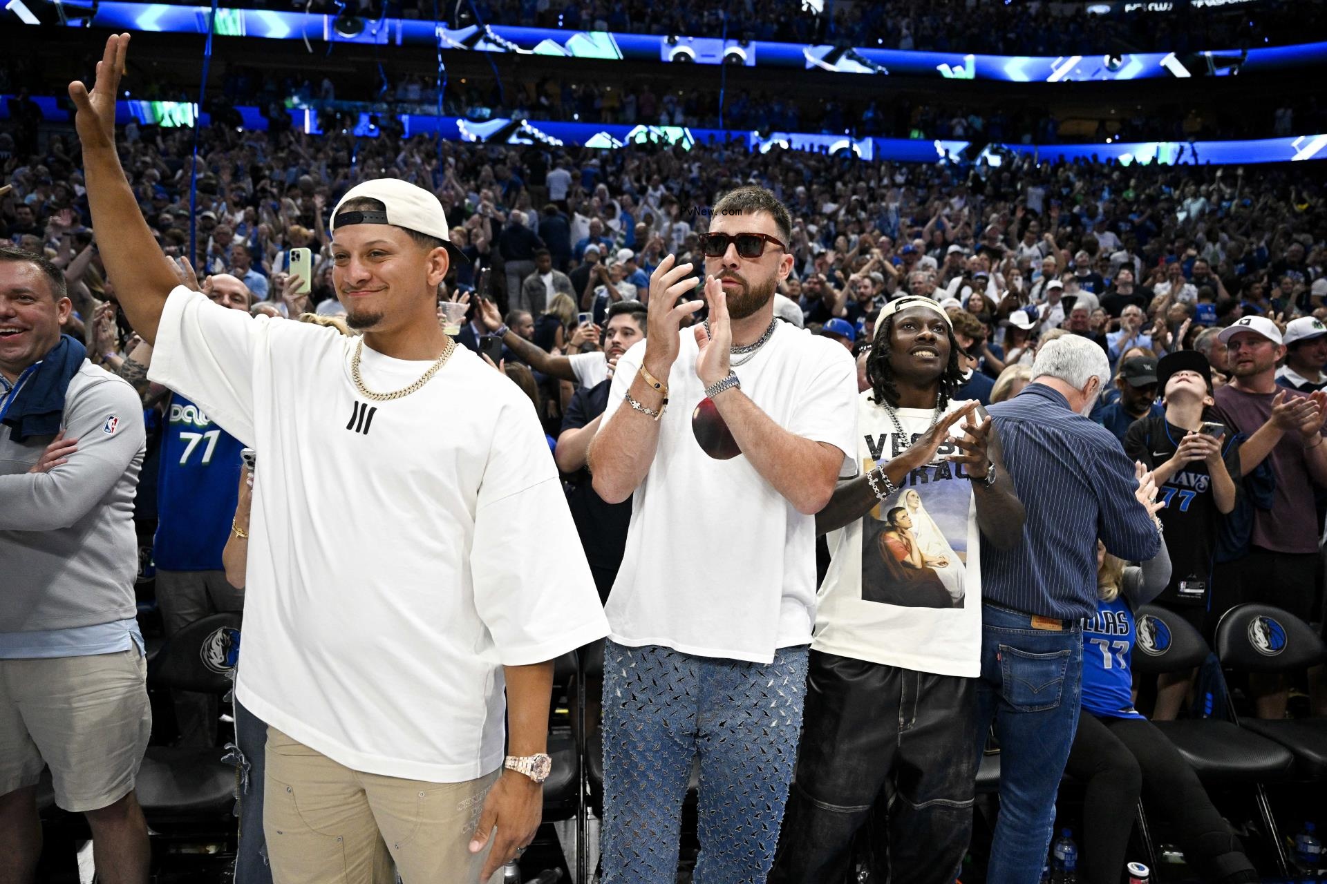 Patrick Mahomes and Travis Kelce at a basketball game