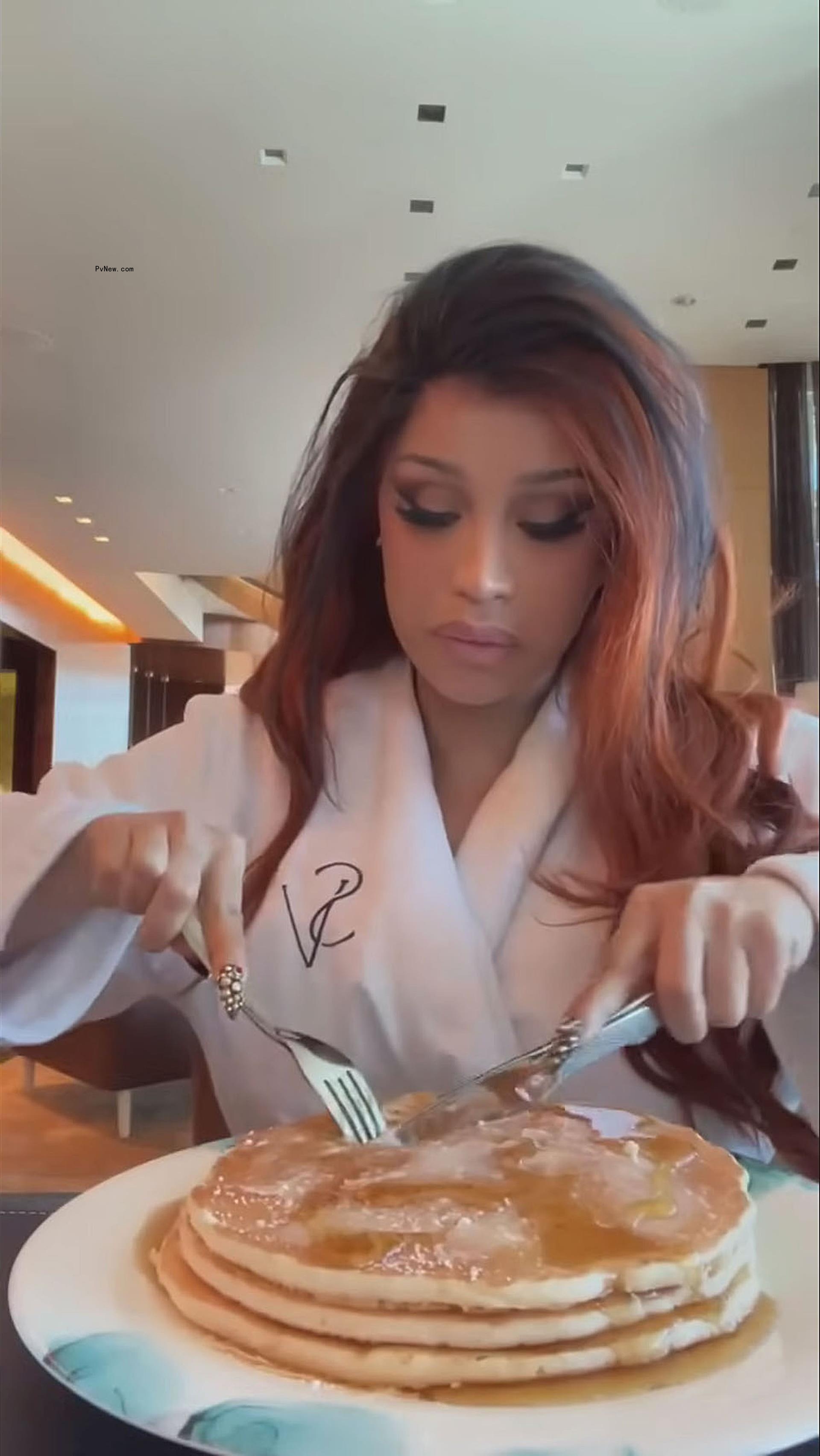 Cardi B eating pancakes.