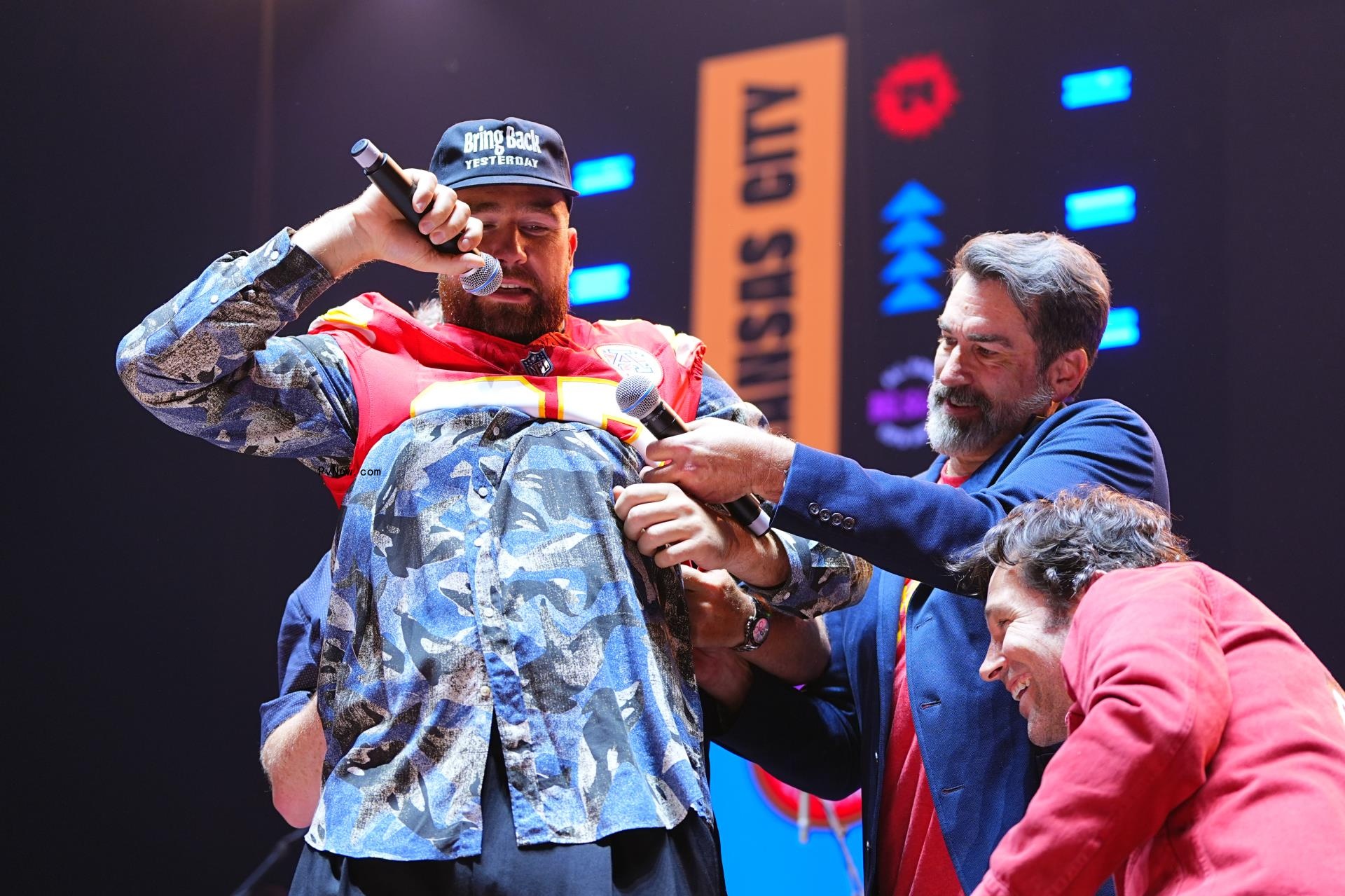 Patrick Mahomes on stage at a charity event