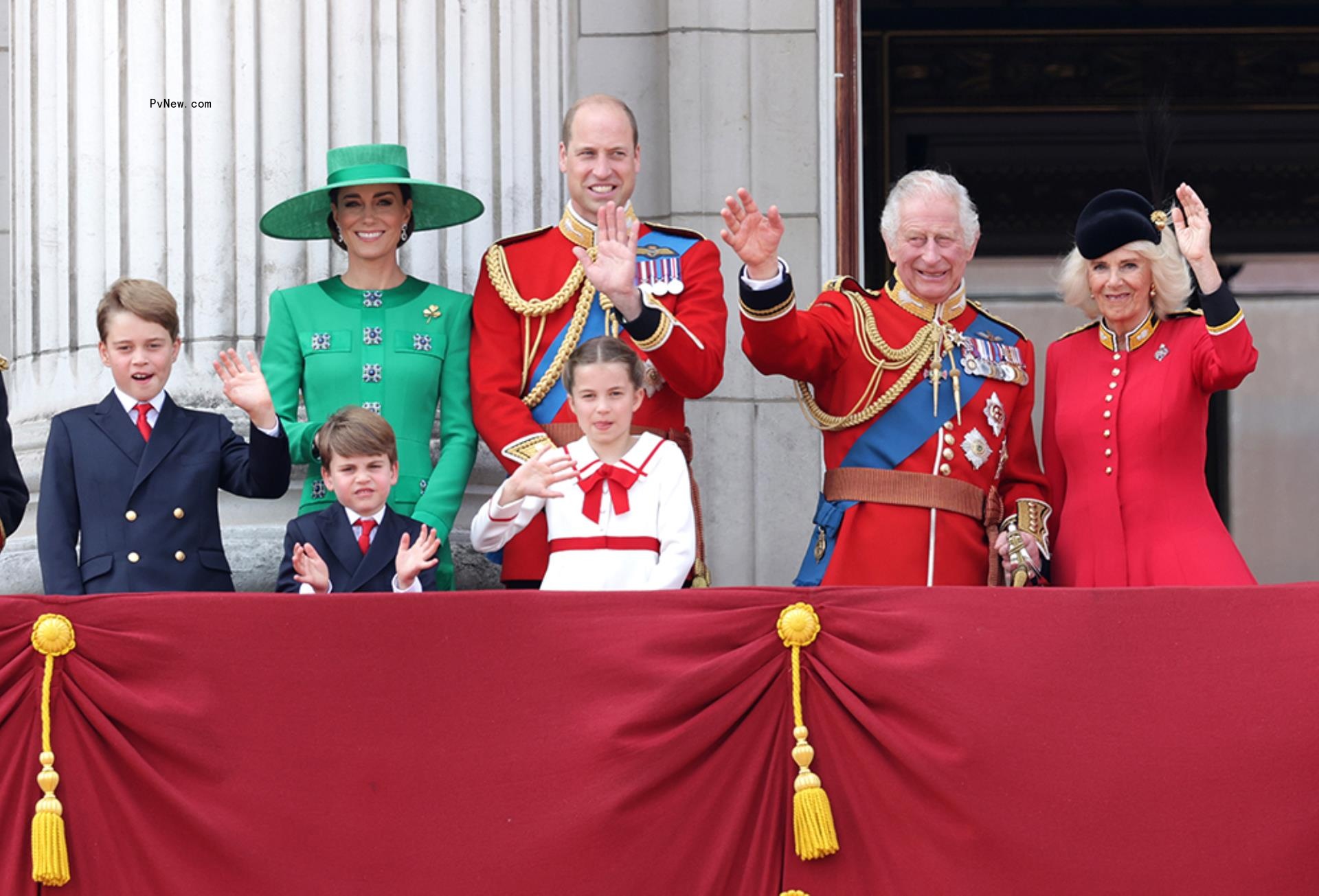 The royal family at a balcony in Buckingham Palace.