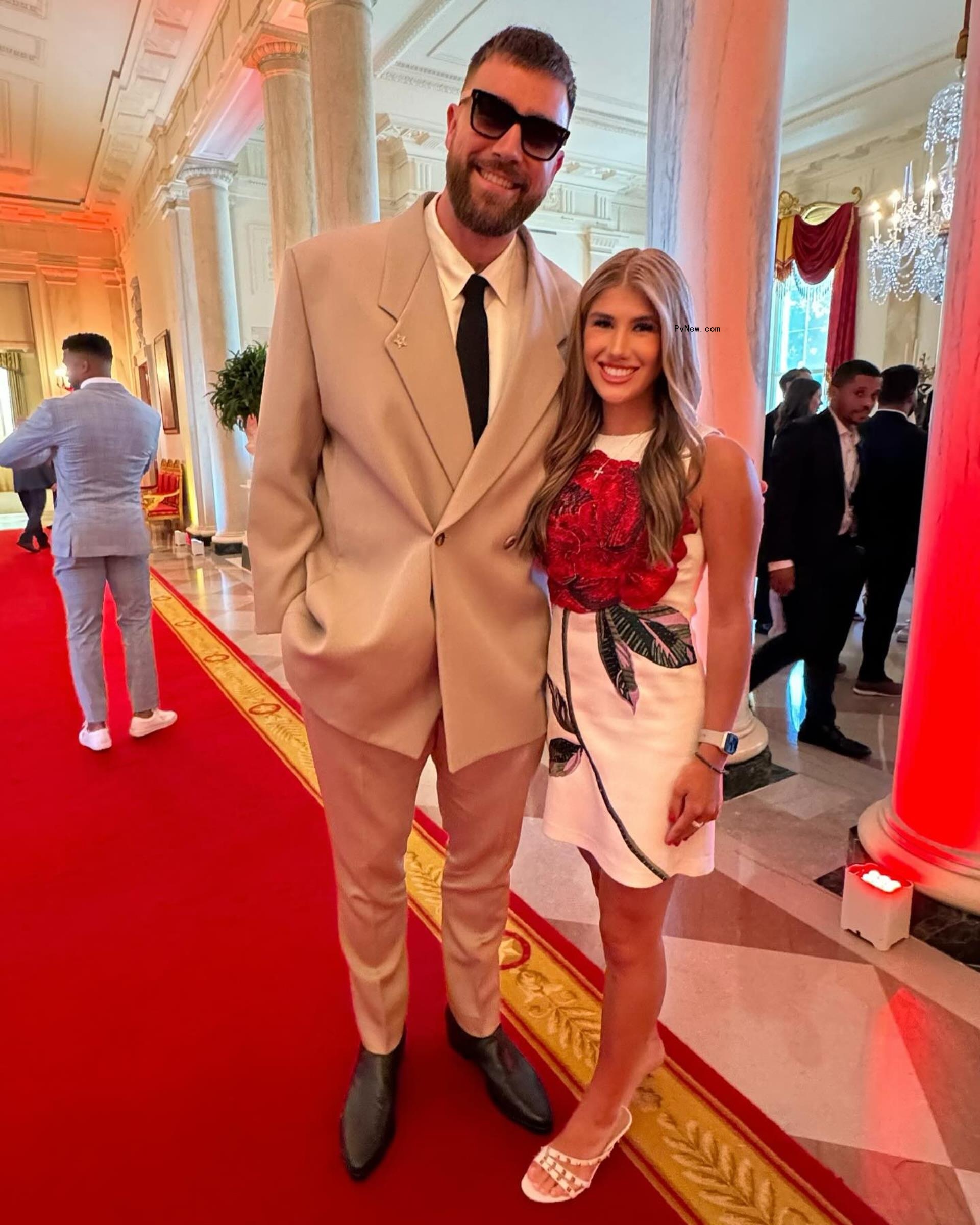 Travis Kelce and Ava Hunt posing together