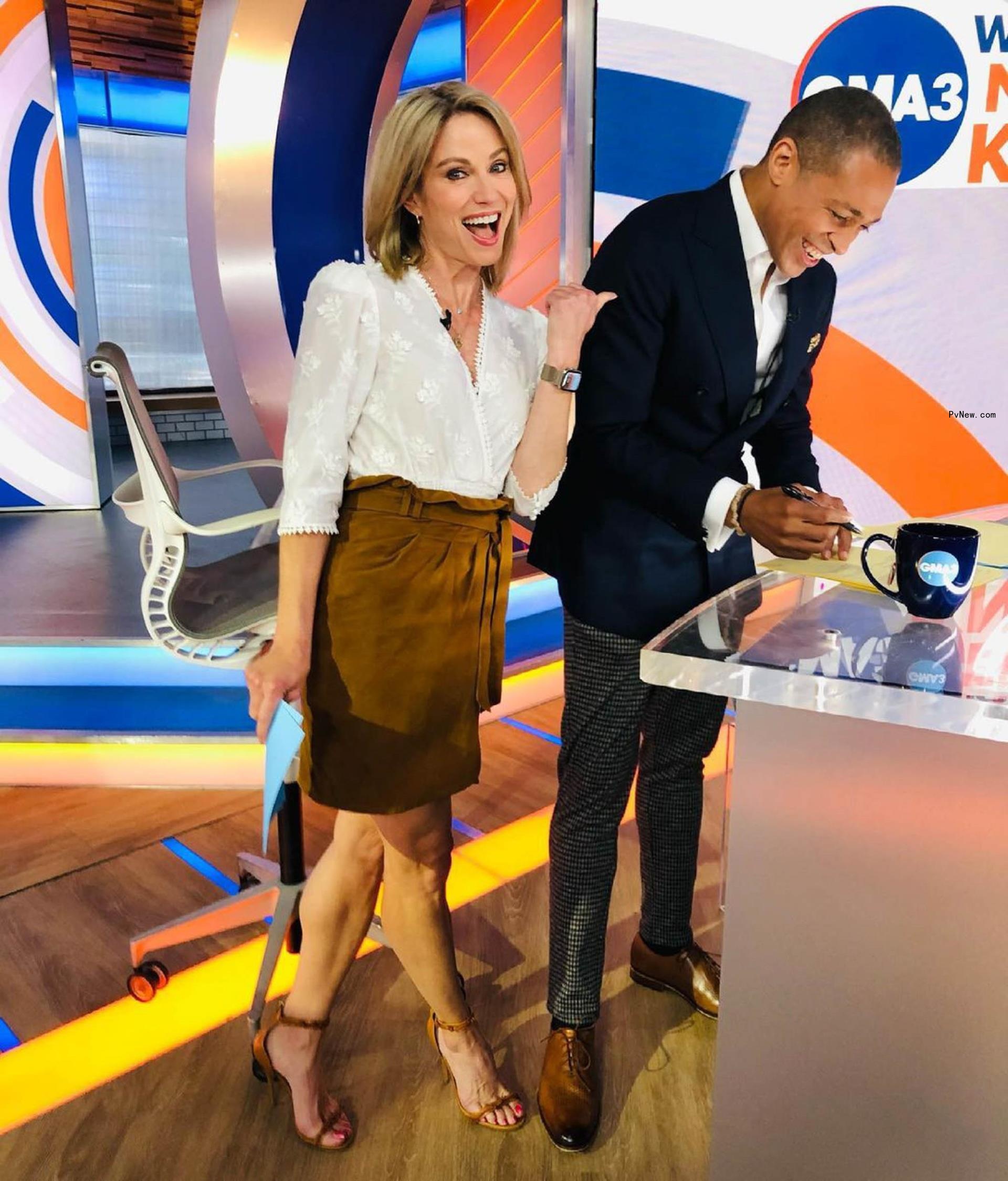 A selfie of Amy Robach and T.J. Holmes