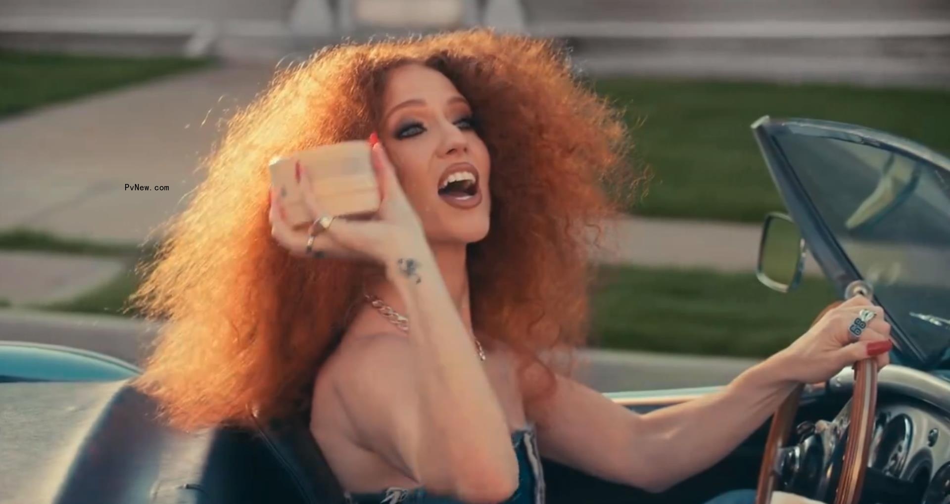 Model throwing fenty hair product