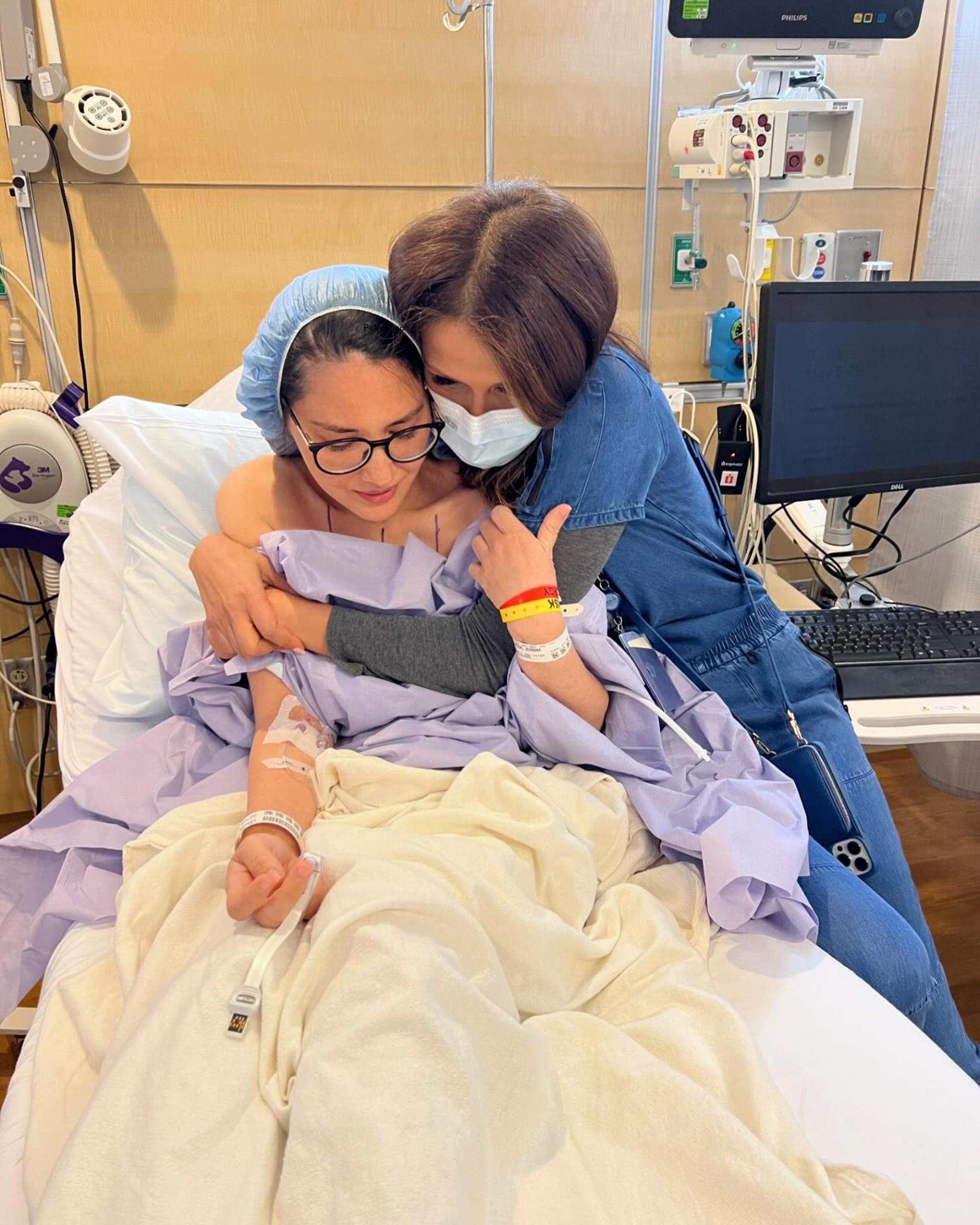 Olivia Munn in the hospital.