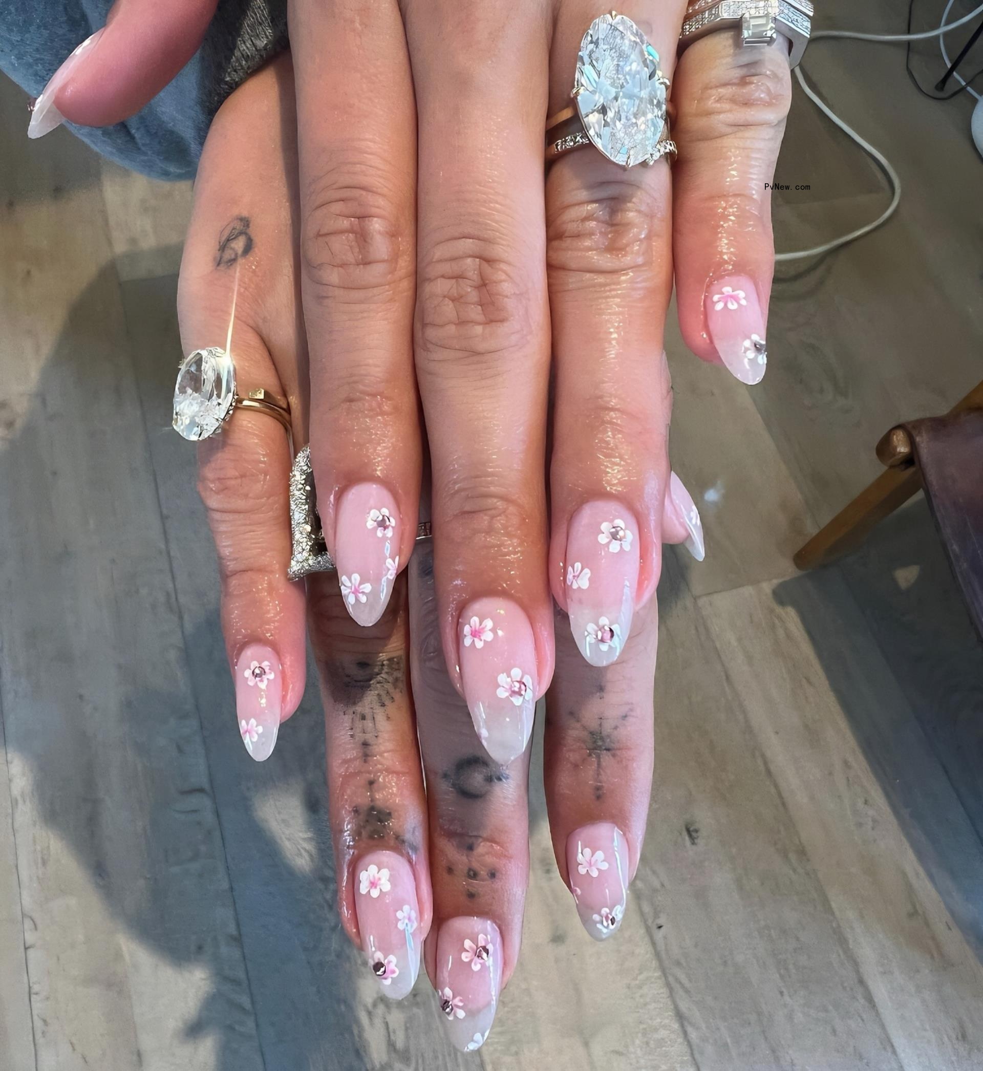 Hailey Bieber's new ring on her hands. 