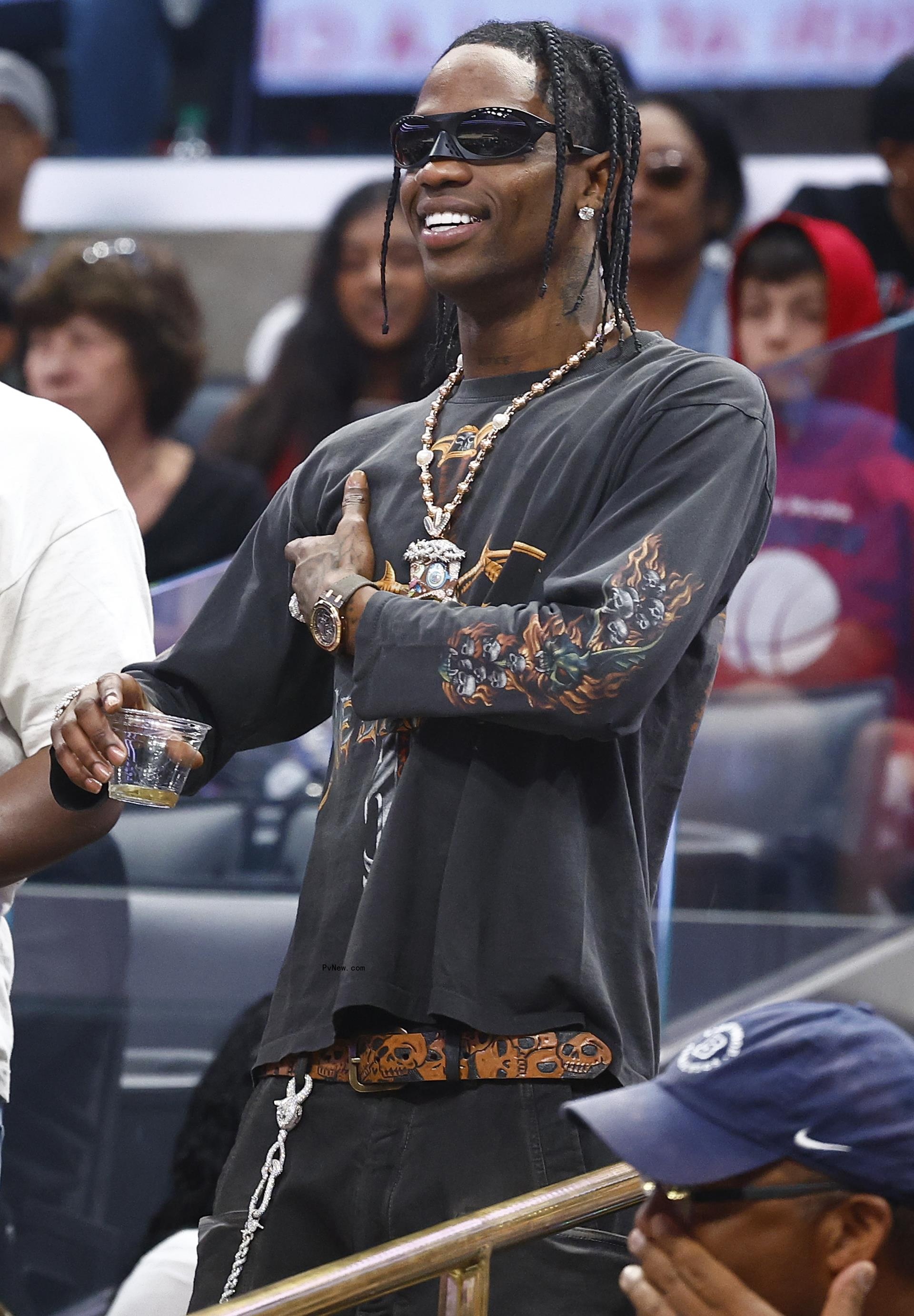 Travis Scott at an NBA game.