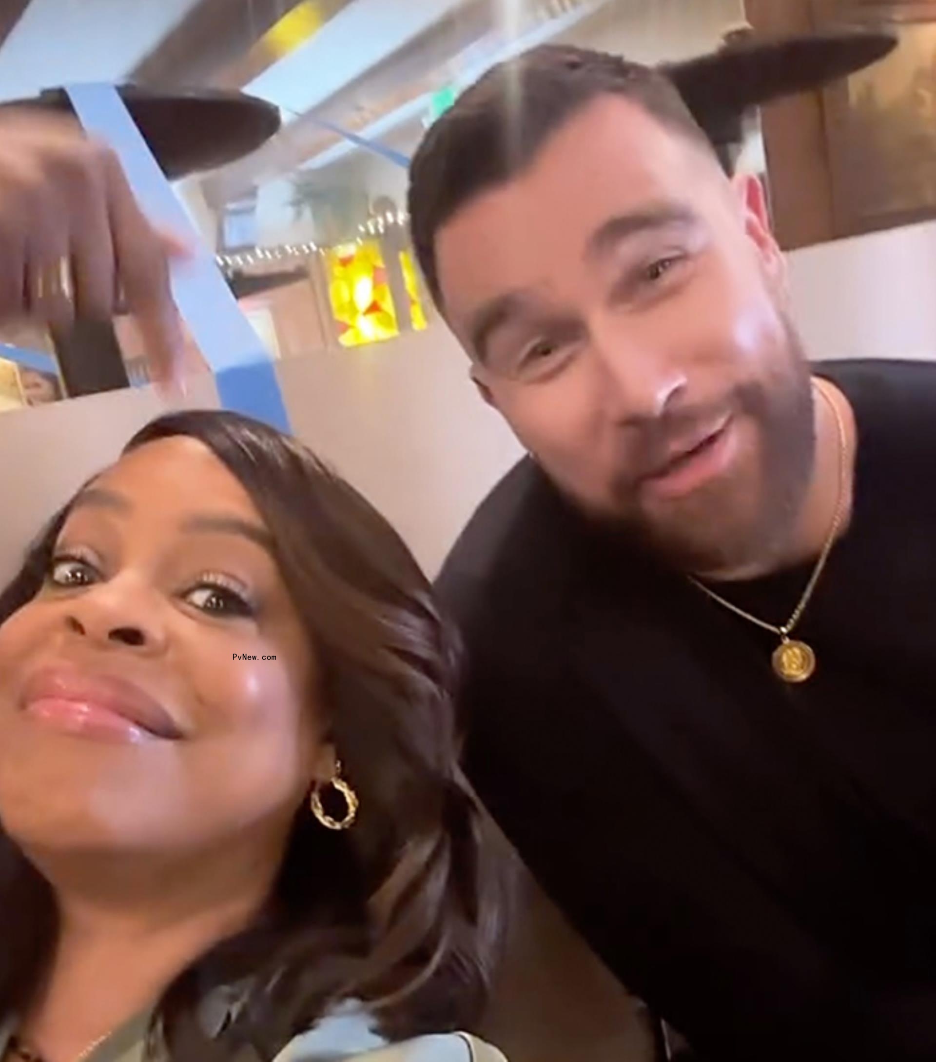 A selfie of Niecy Nash and Travis Kelce