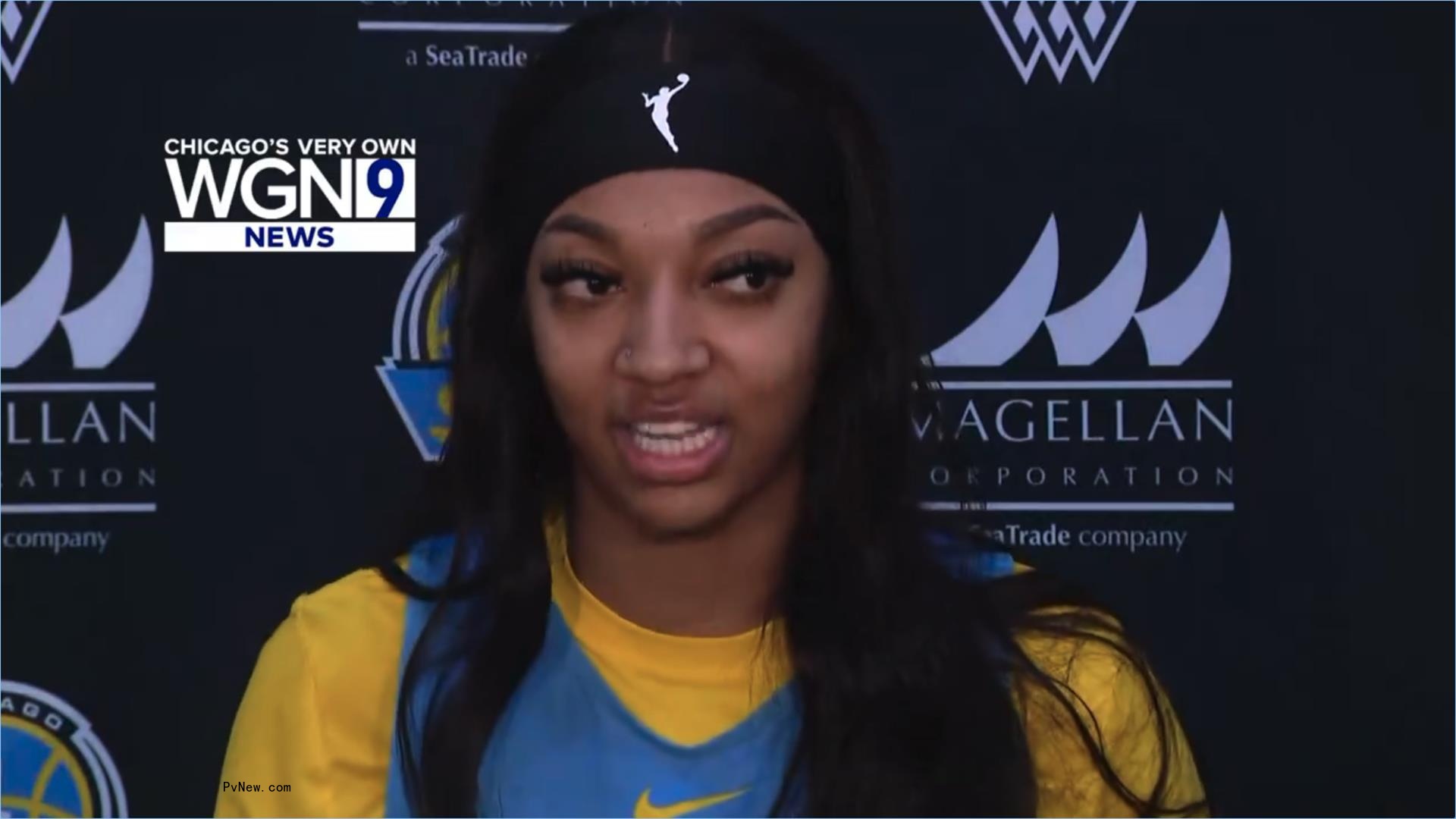 Angel Reese talking to reporters.