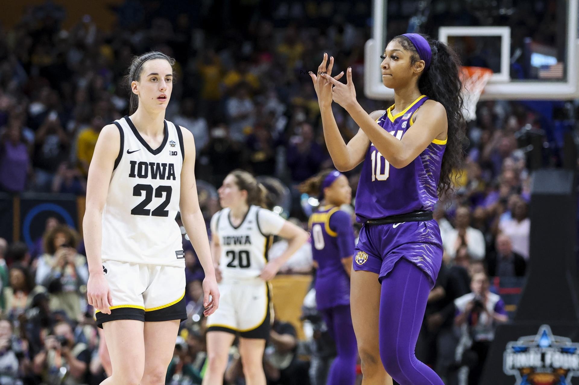 Angel Reese and Caitlin Clark playing basketball.