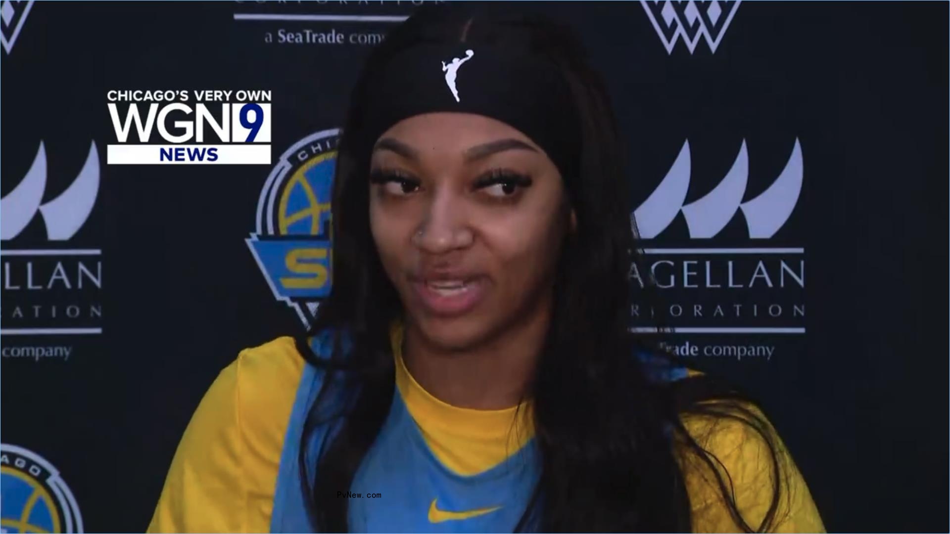 Angel Reese talking to reporters.