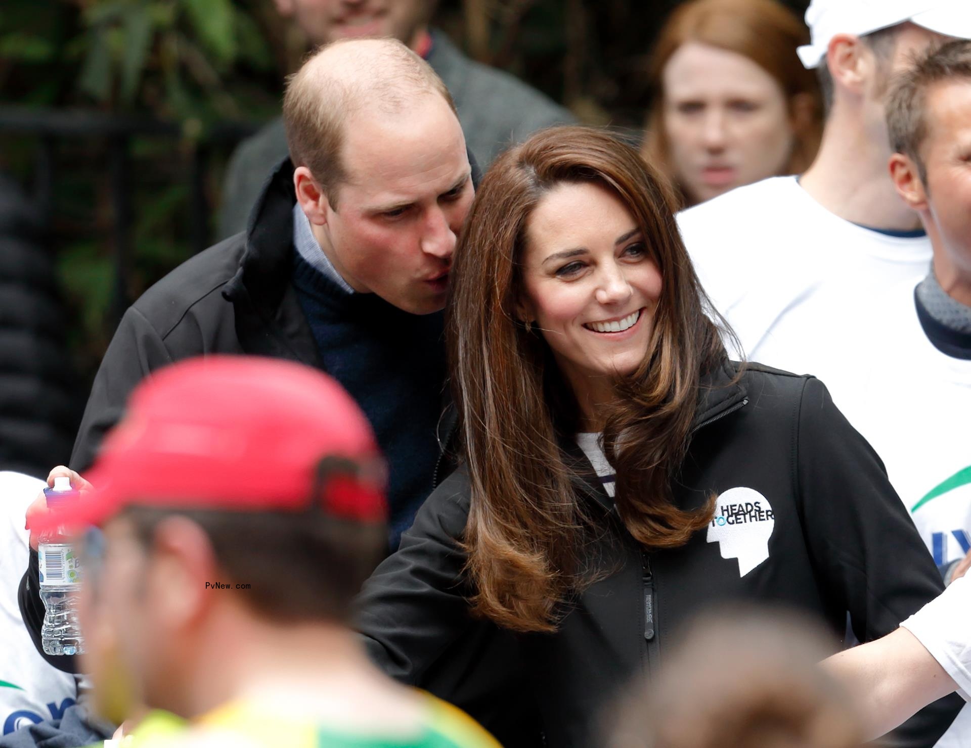 Kate Middleton smiling with Prince William