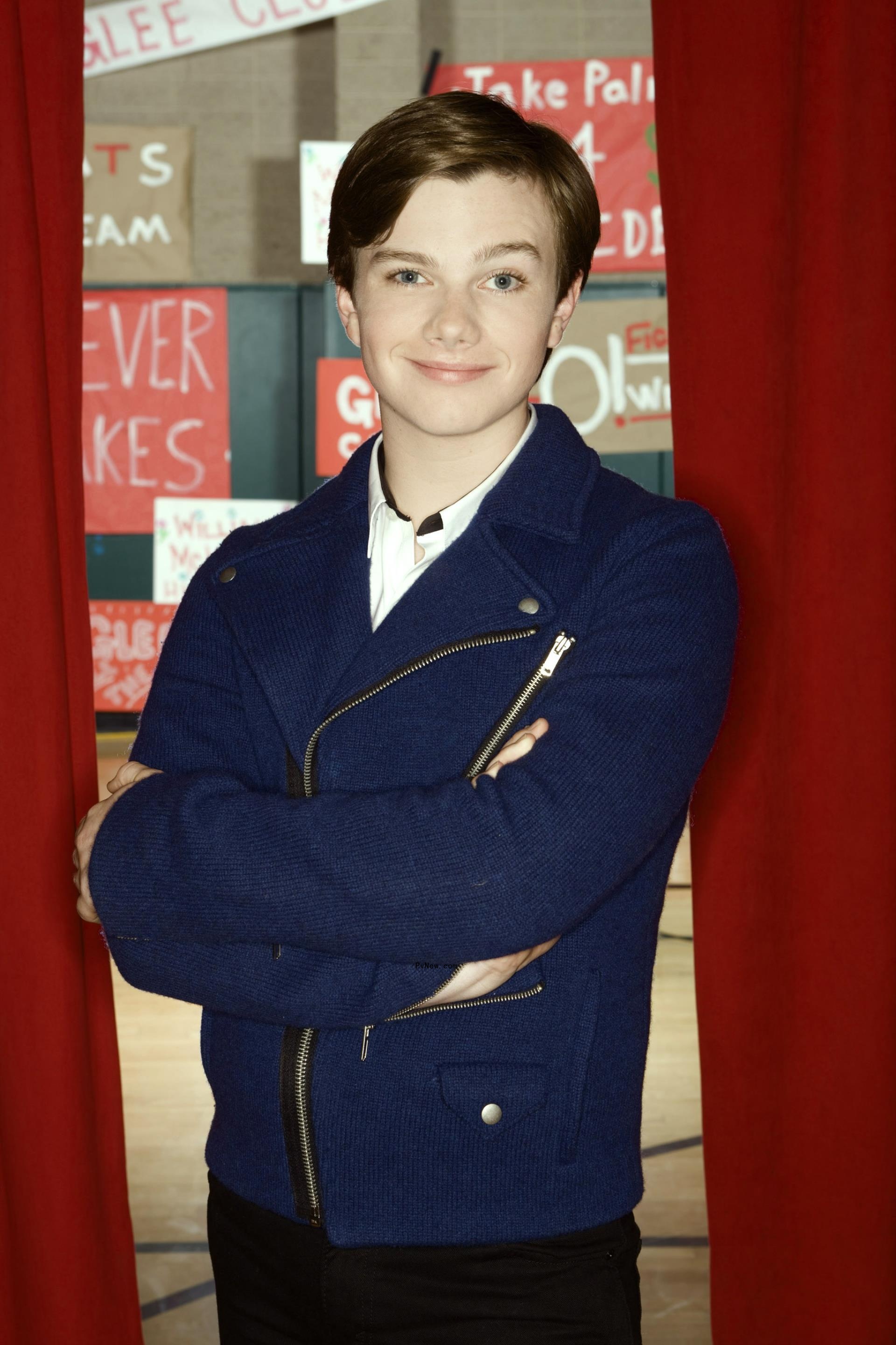 Chris Colfer poses for set photo