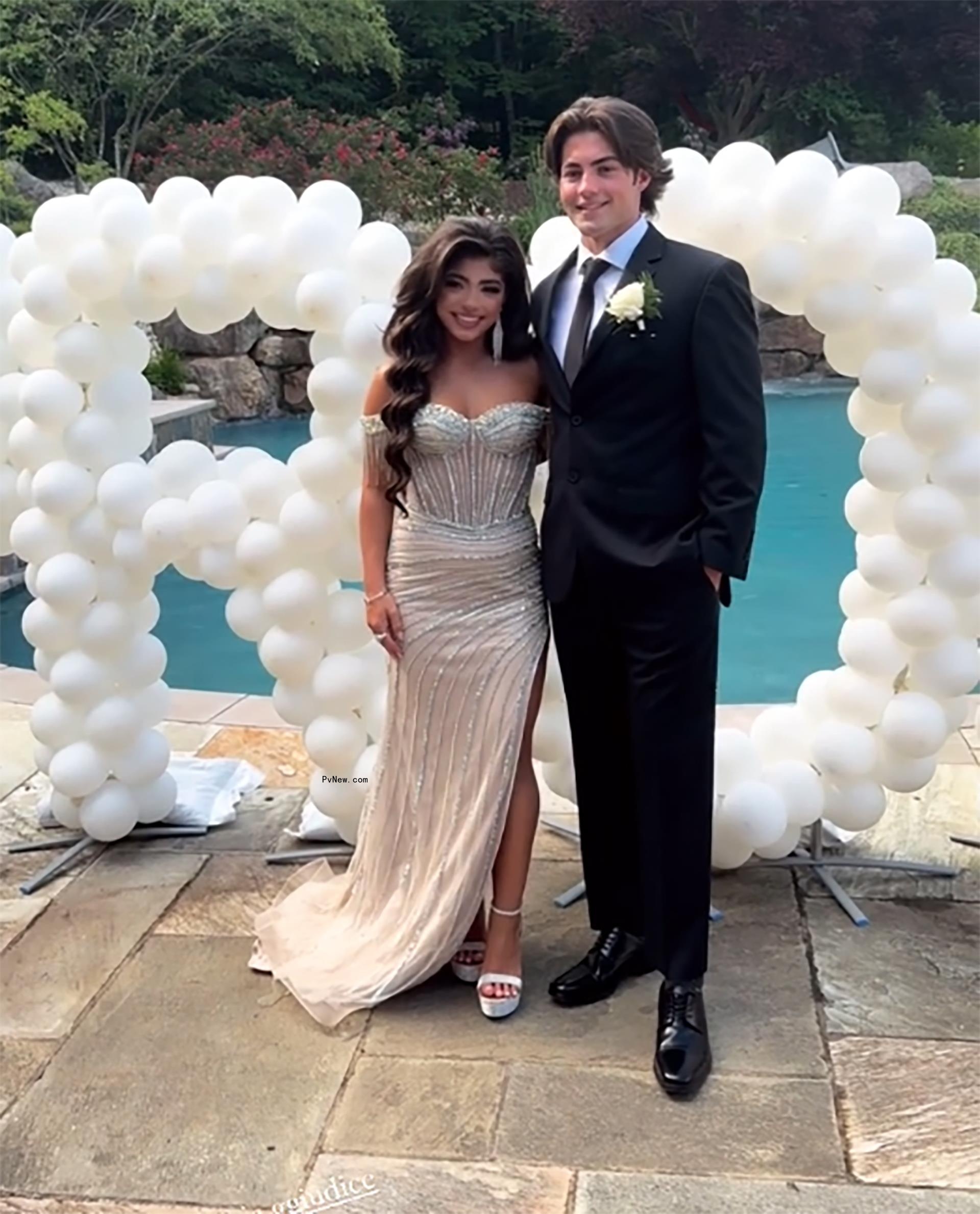 Milania Giudice posing for prom with her date