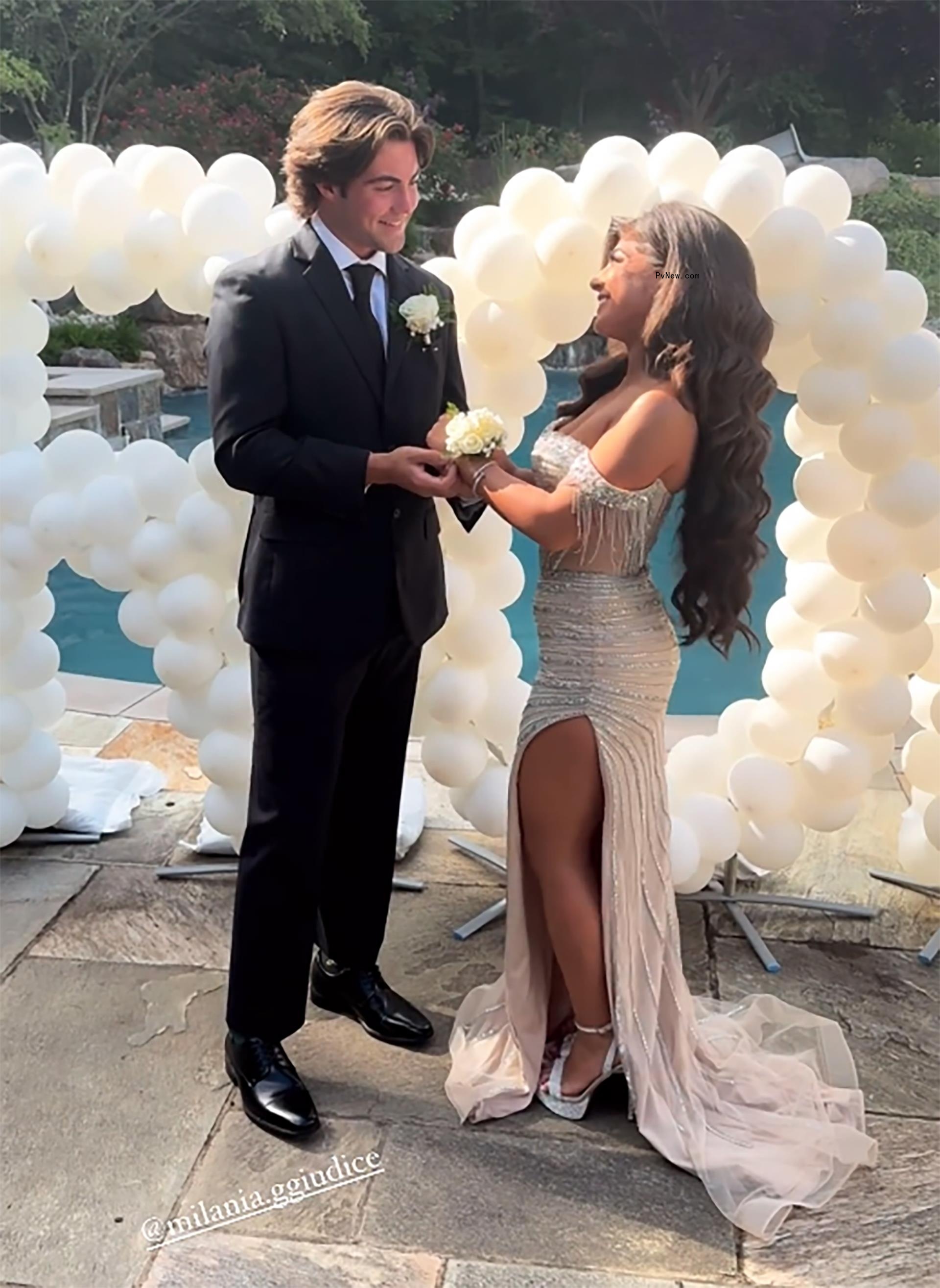 Milania Giudice posing with her prom date