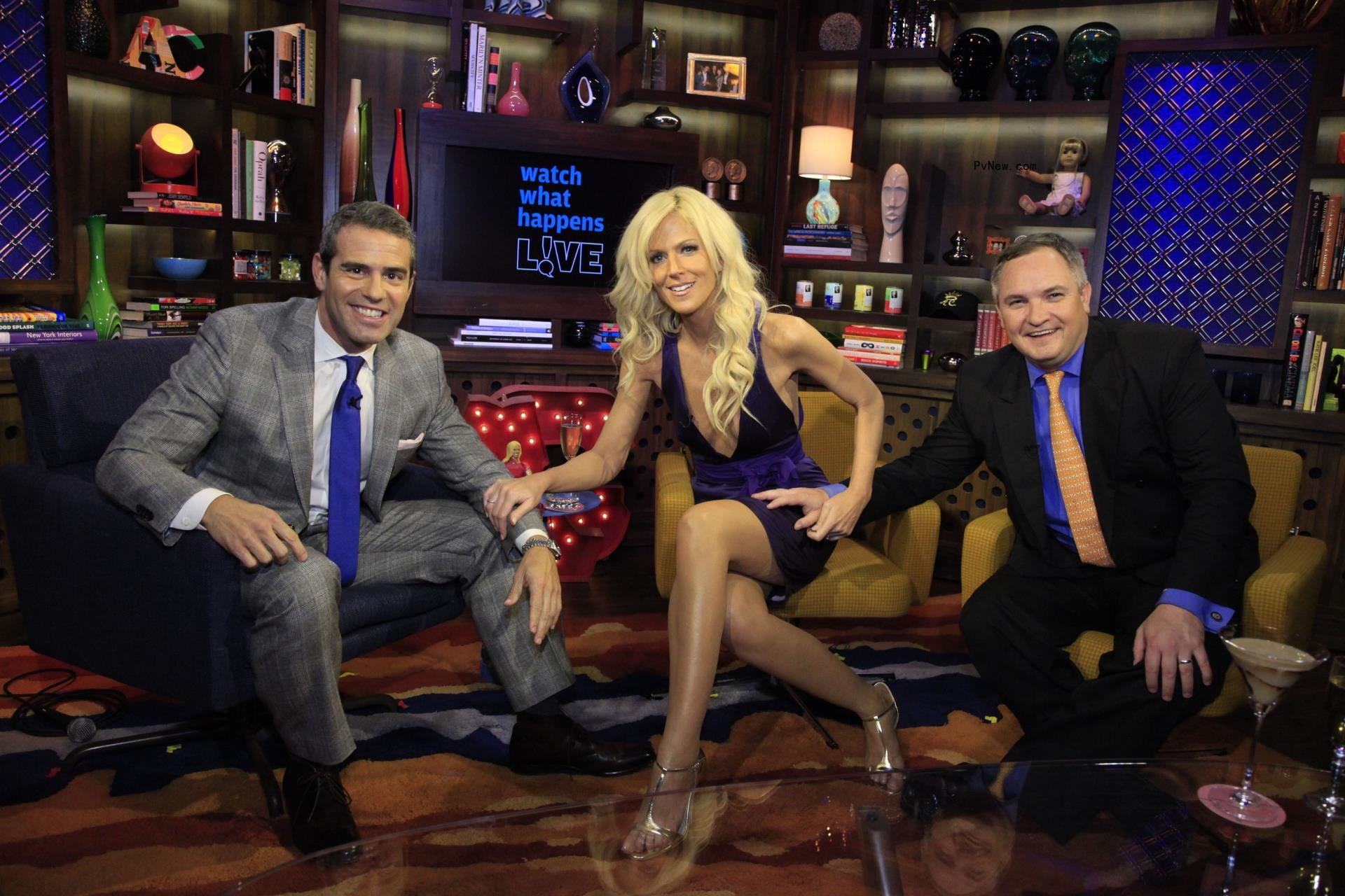 Andy Cohen sitting with Michaele and Tareq Salahi