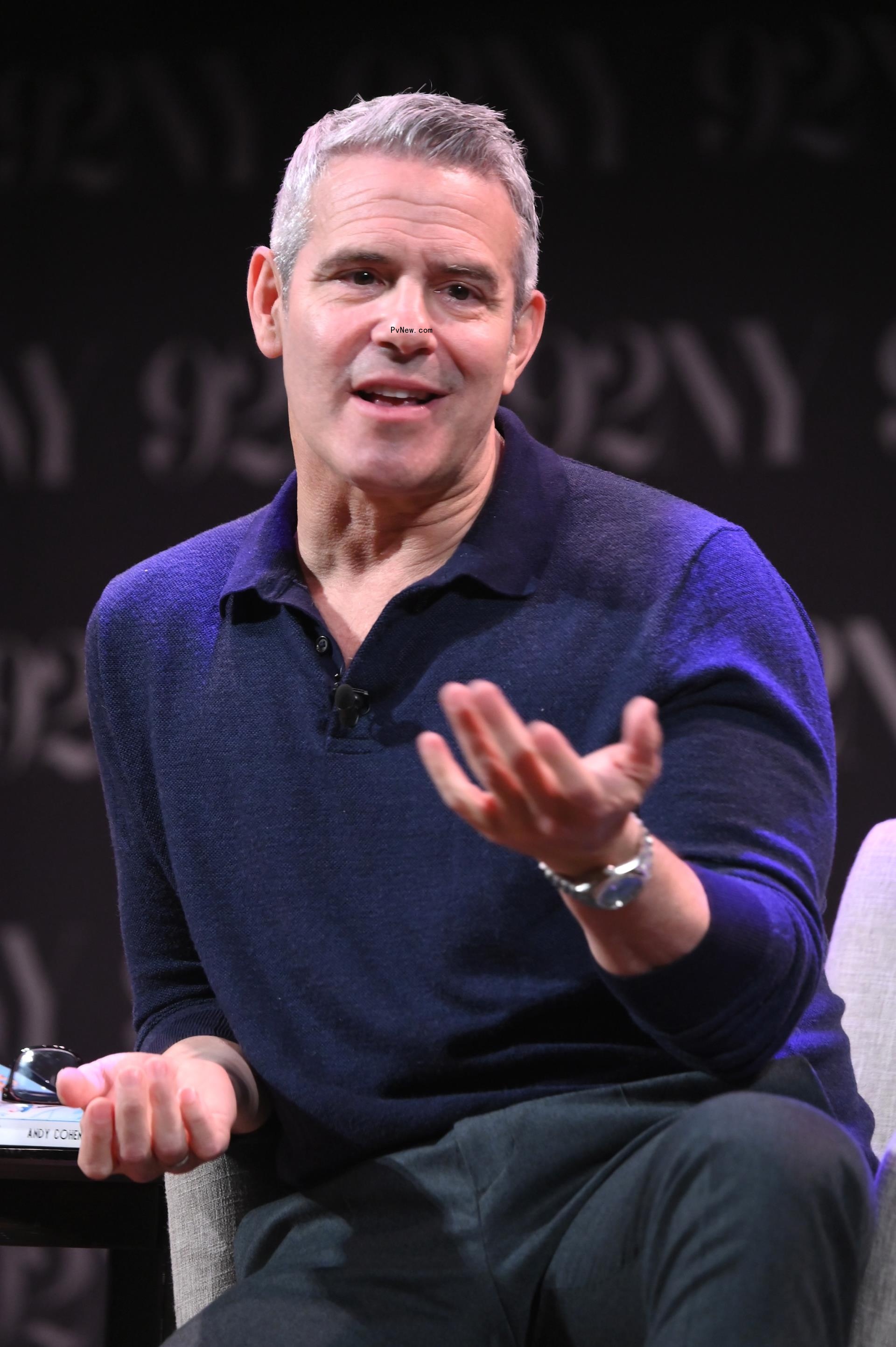 Andy Cohen sitting and talking
