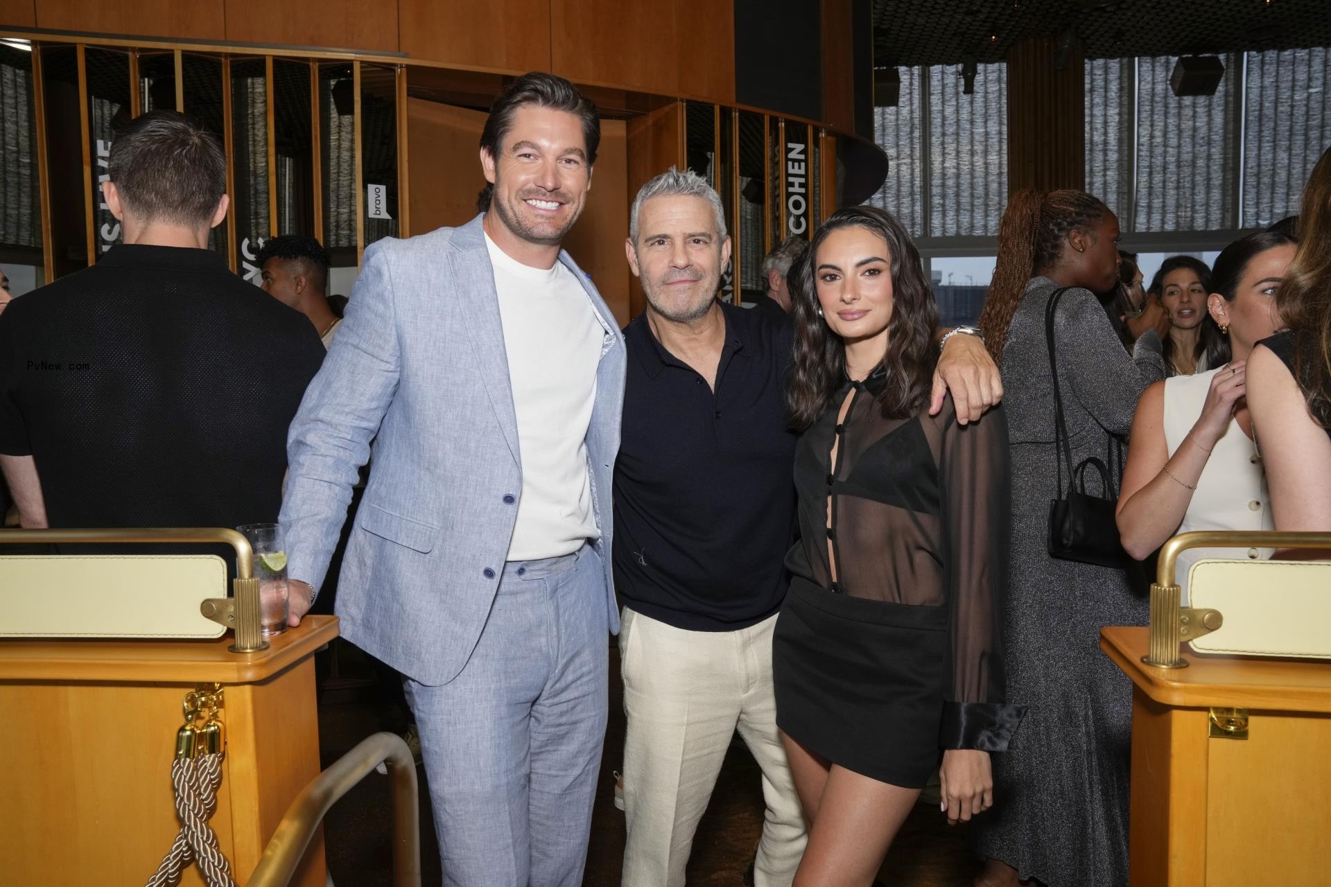 Craig Conover, Andy Cohen, Paige DeSorbo posing together