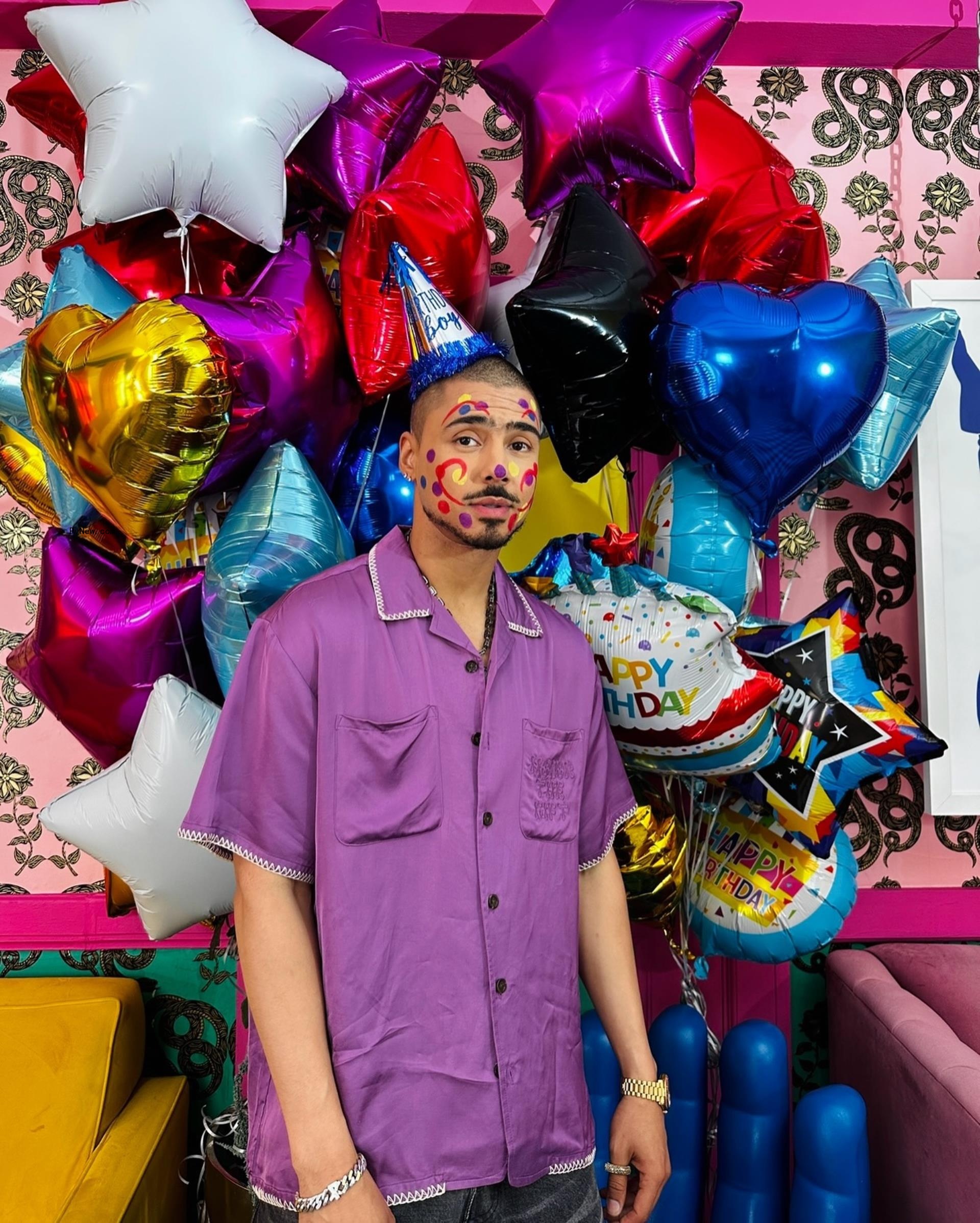 Quincy Brown in clown makeup.
