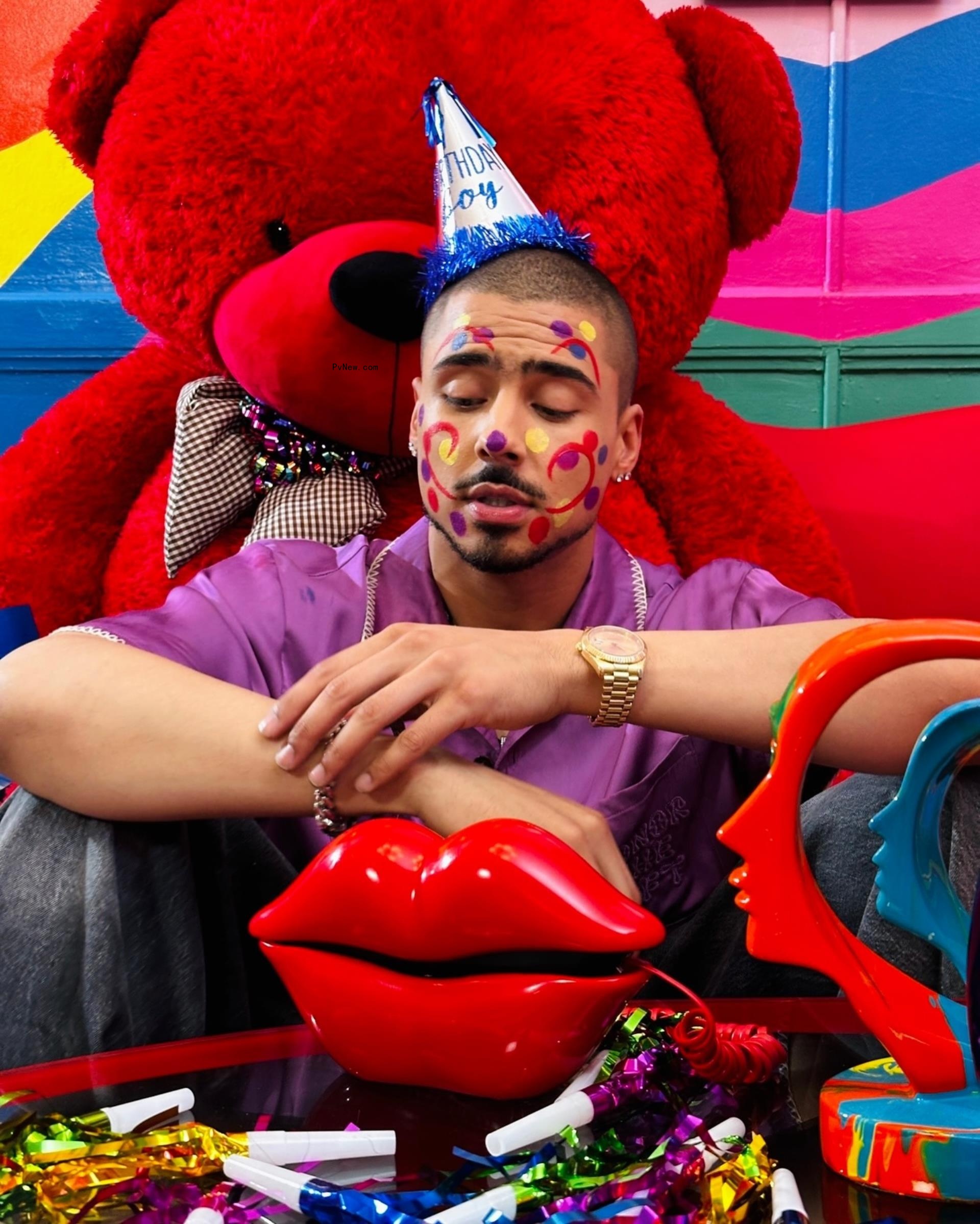 Quincy Brown in clown makeup.