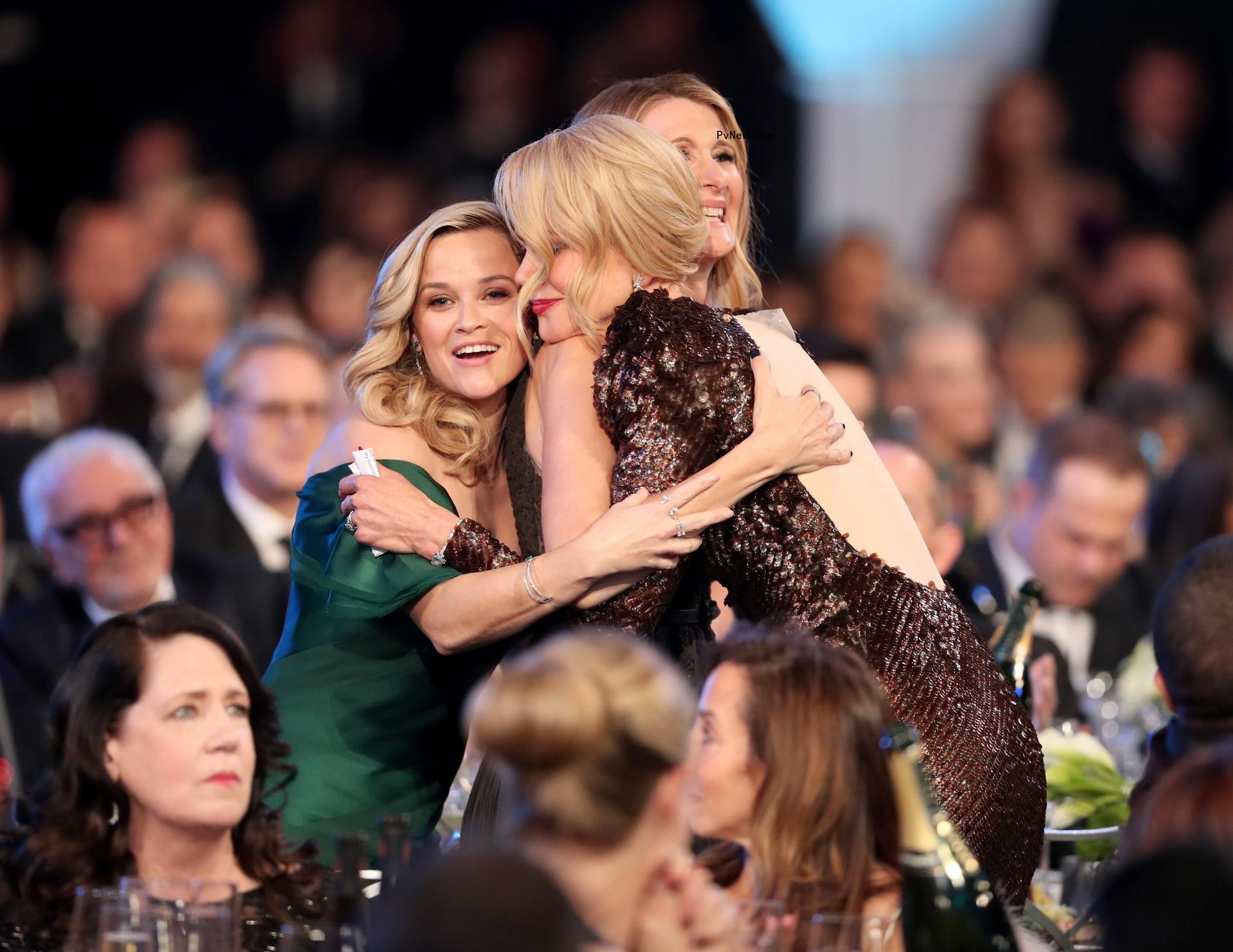 Laura Dern, Reese Witherspoon and Nicole Kidman hugging. 