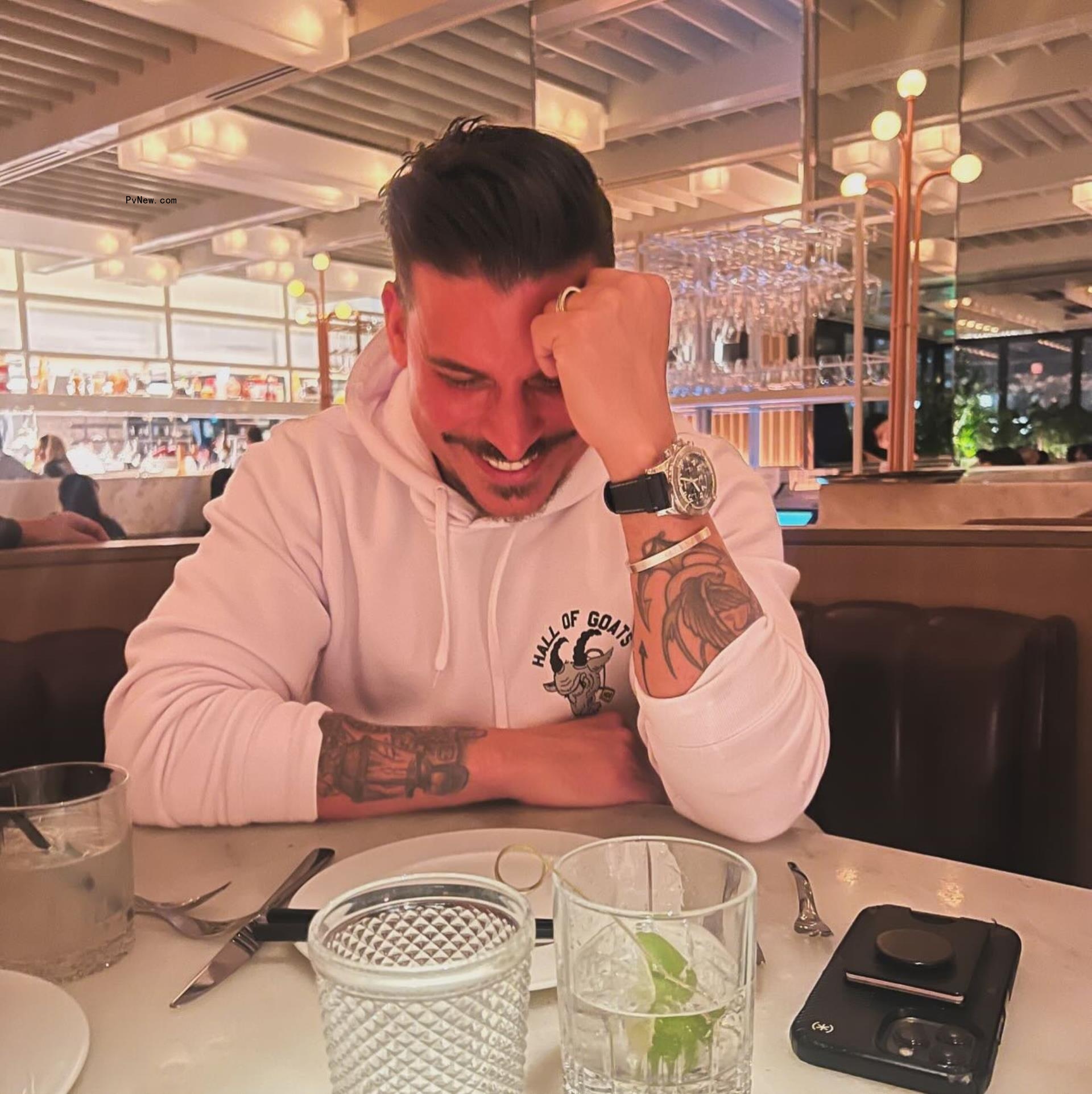 Jax Taylor sitting at a restaurant 