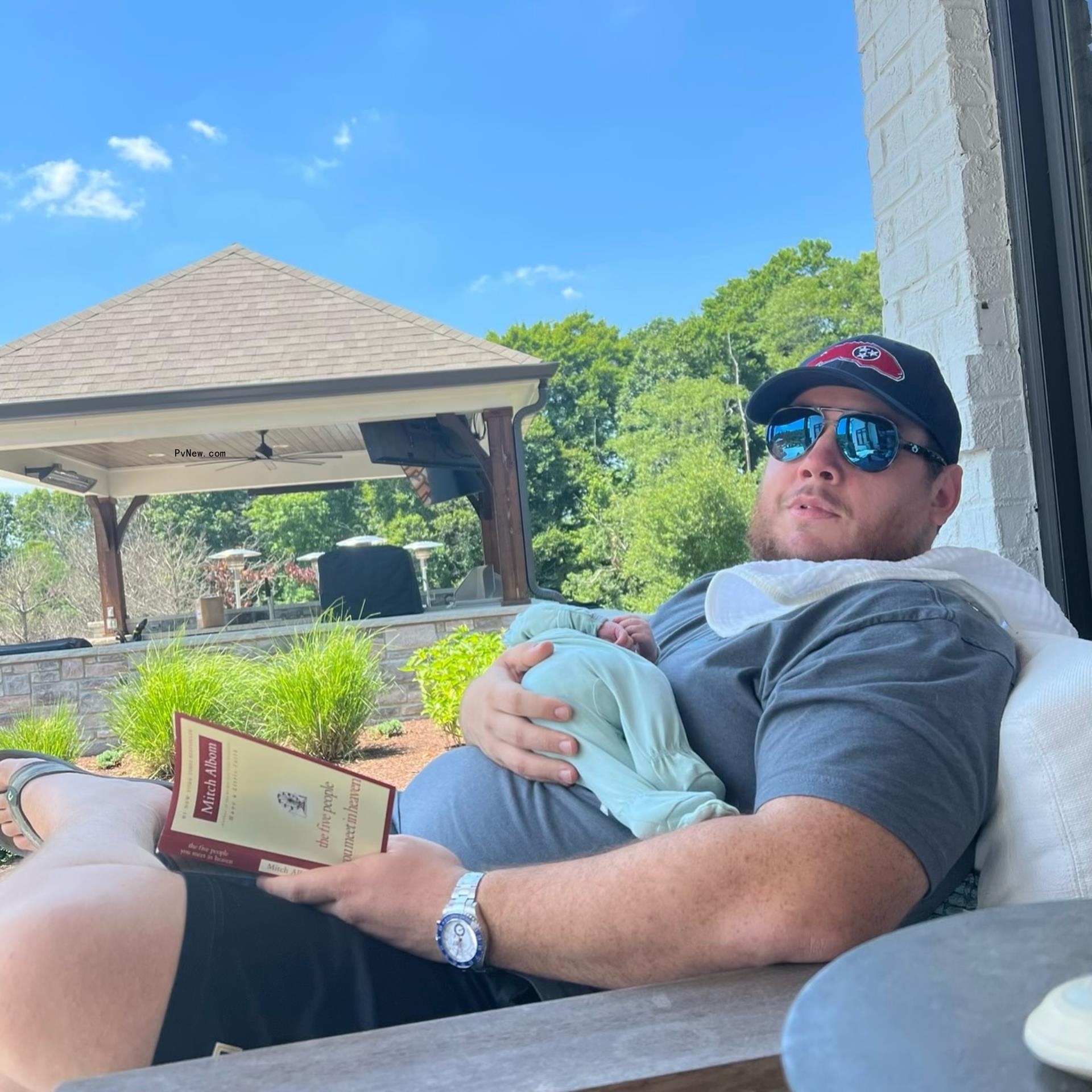 Luke Combs holding son Beau