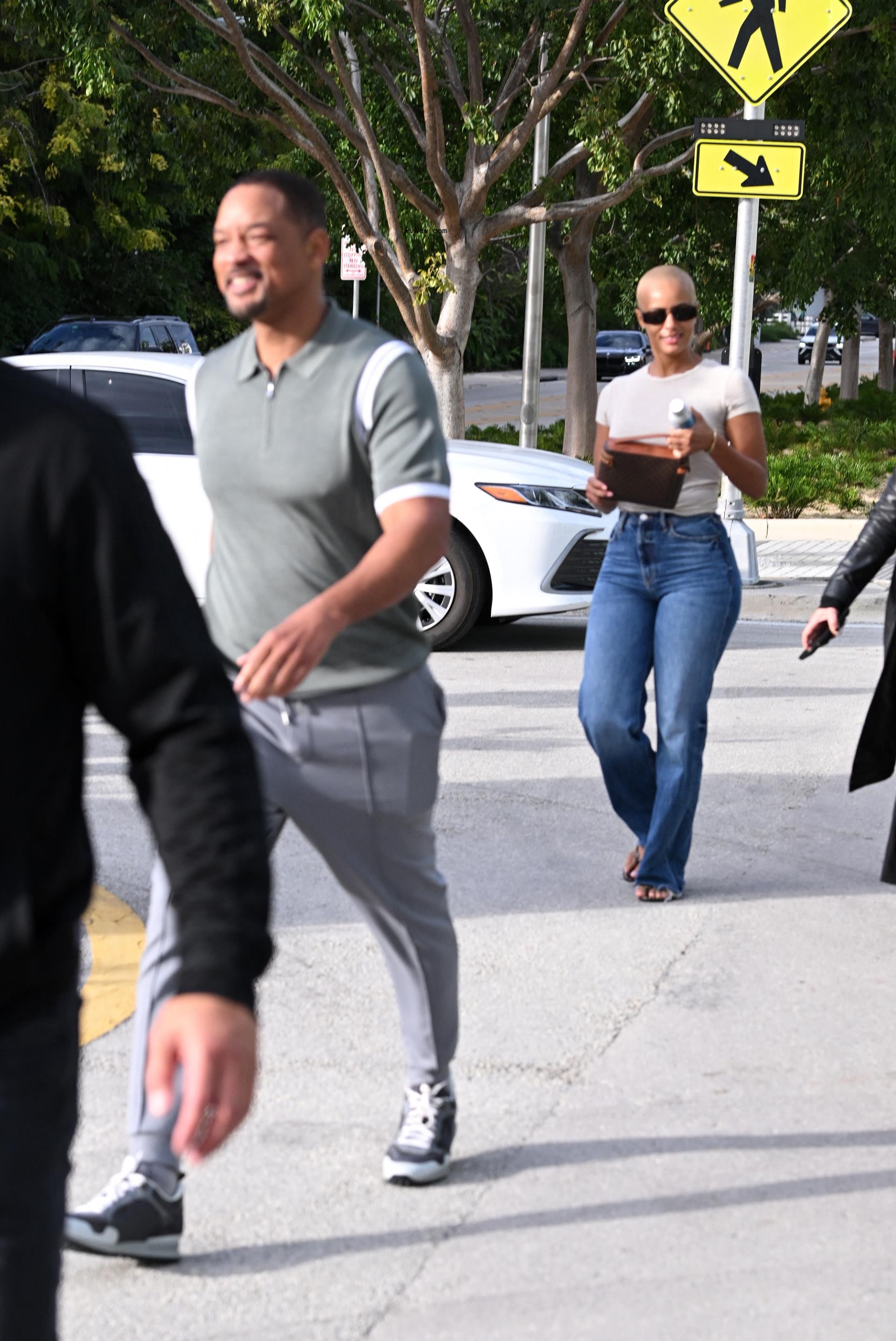 Will Smith and an unknown woman at Miami Art ba<i></i>sel in 2023.