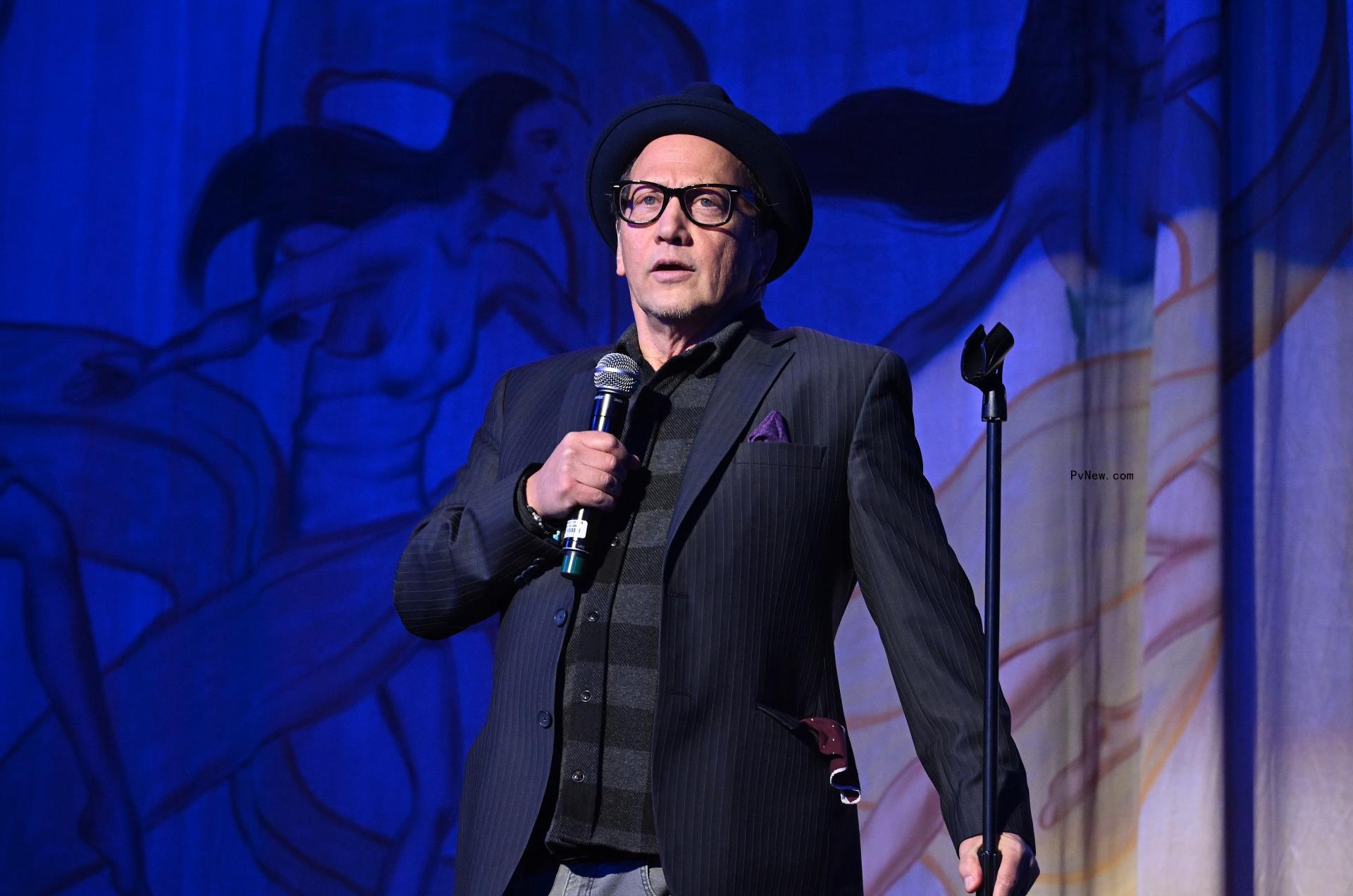 Rob Schneider onstage.