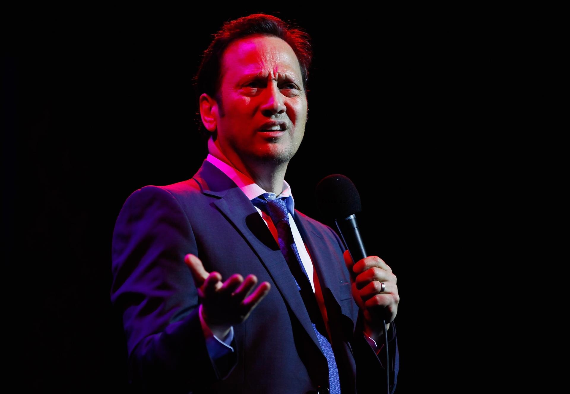 Rob Schneider onstage.