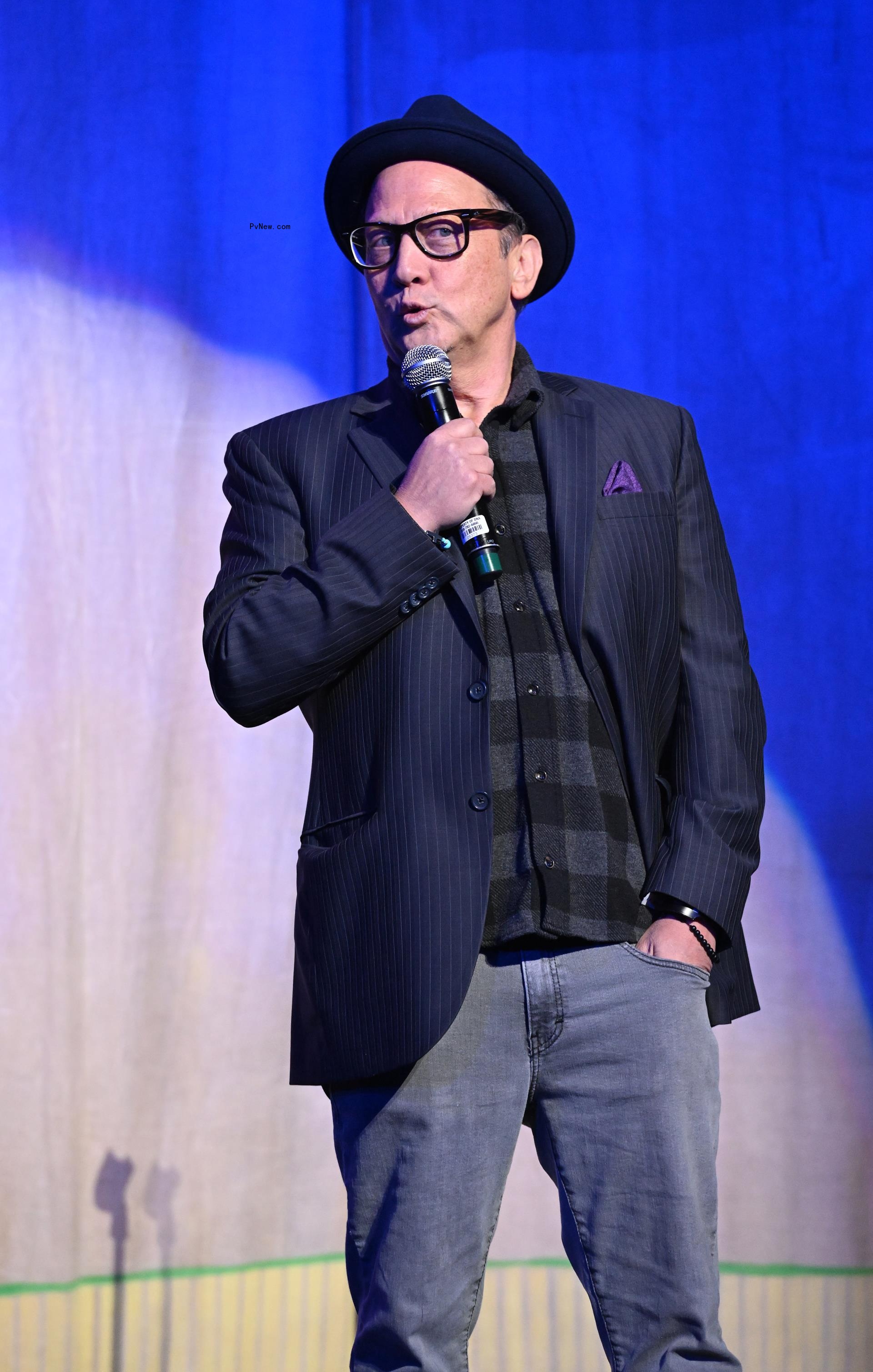 Rob Schneider onstage.