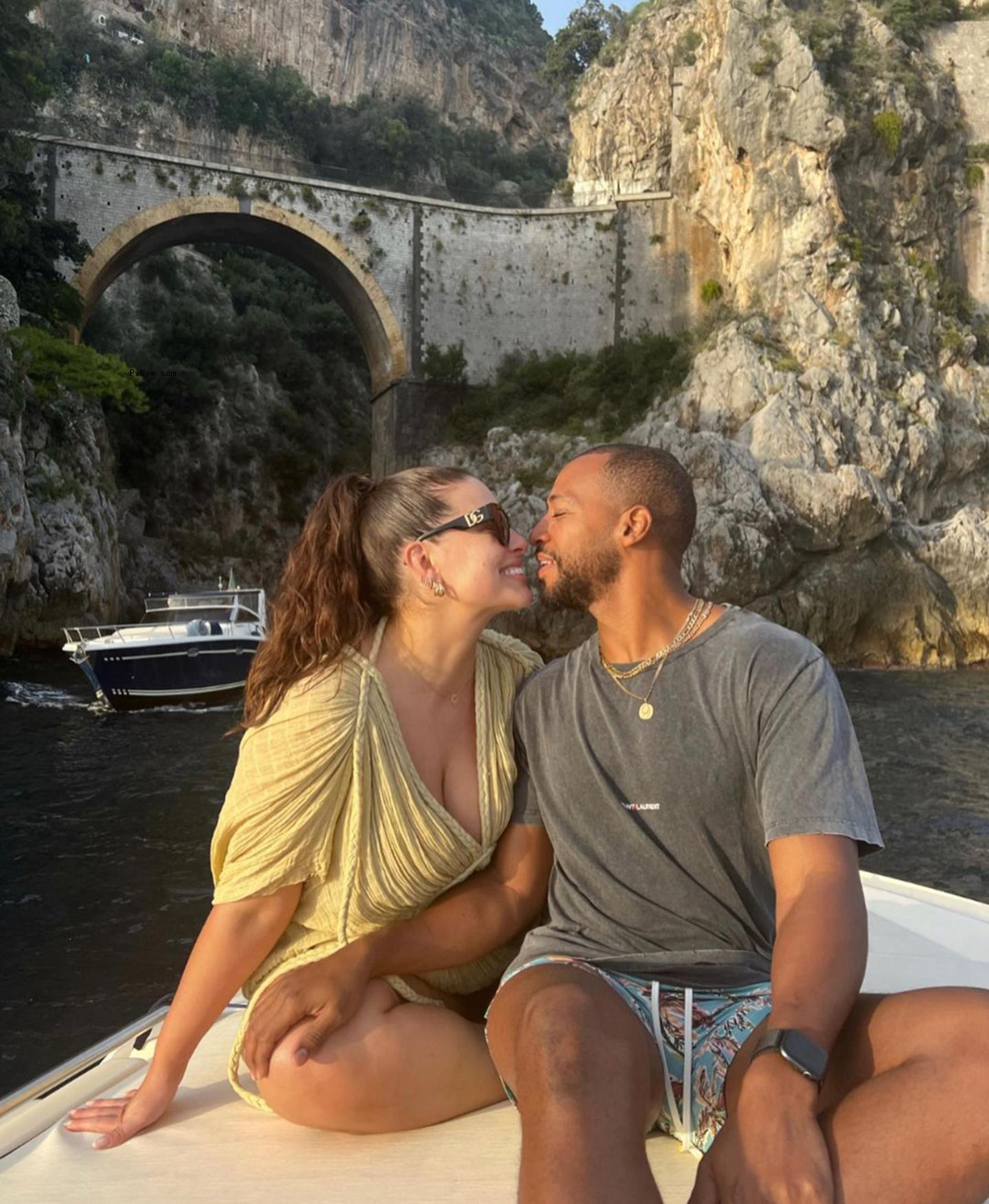 Ashley Graham and Justin Ervin on a boat. 