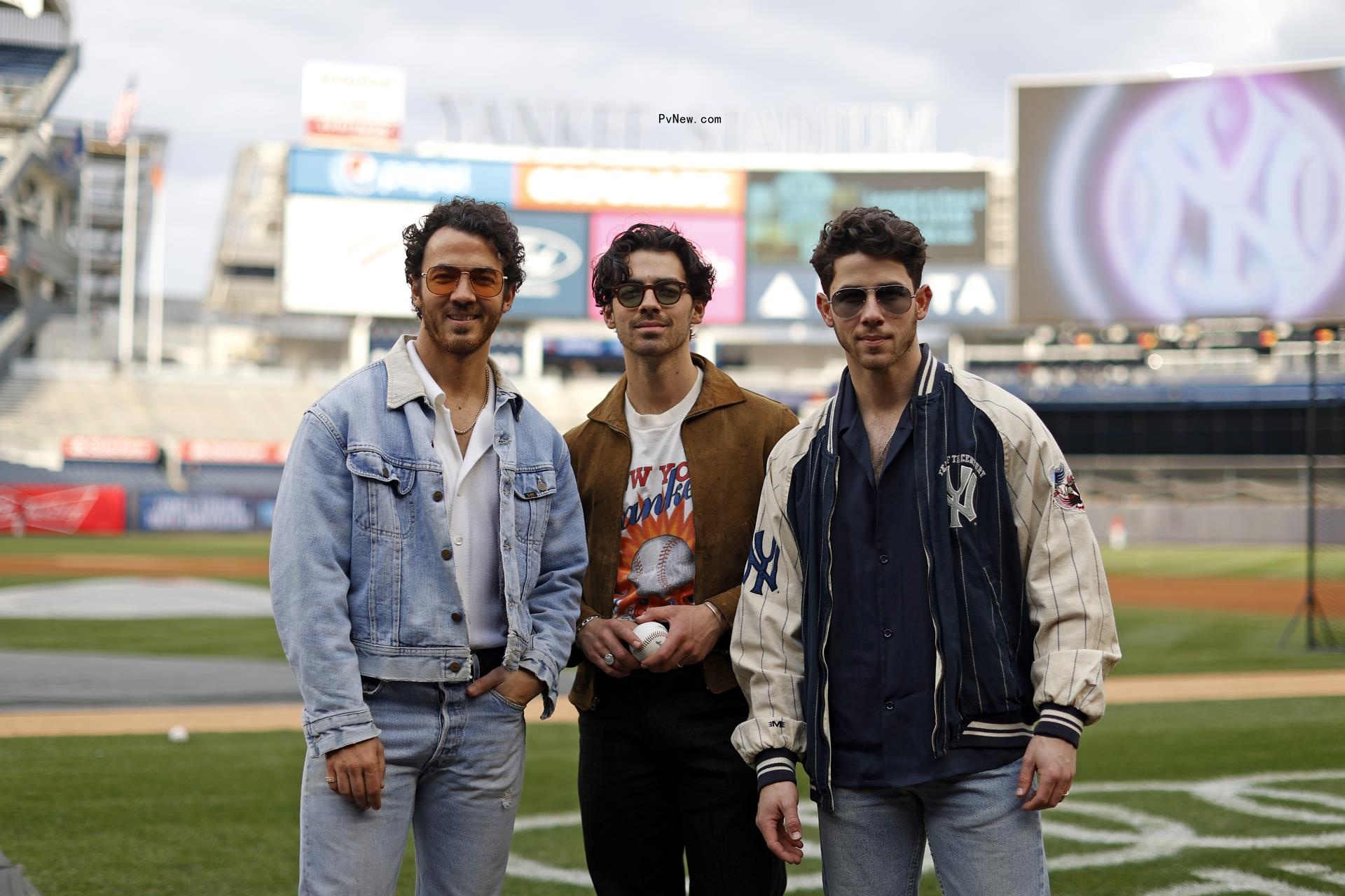 The Jo<i></i>nas Brothers at a Philadelphia Phillies and New York Yankees ba<i></i>seball game