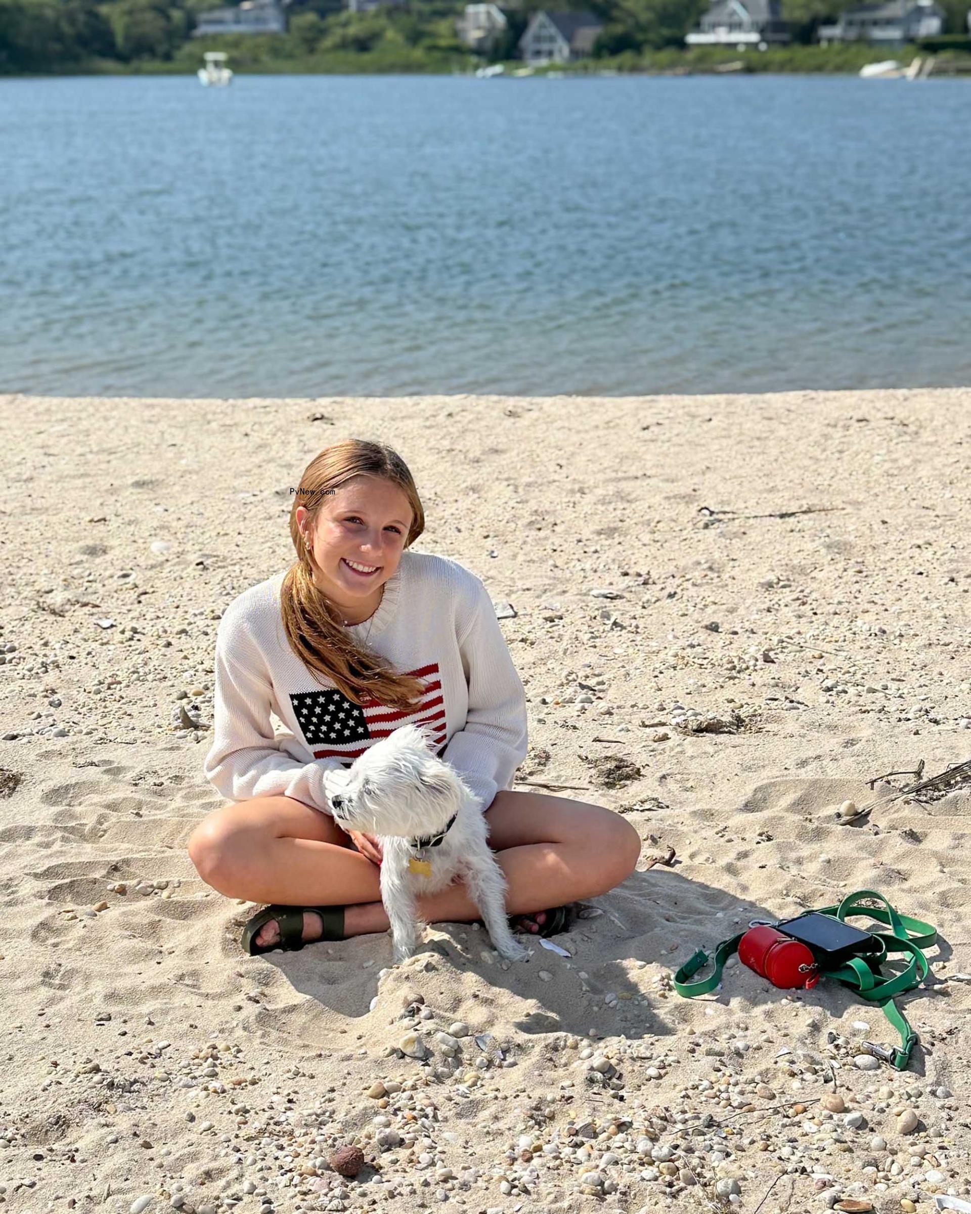 Bryn Hoppy with her dog in the Hamptons. 