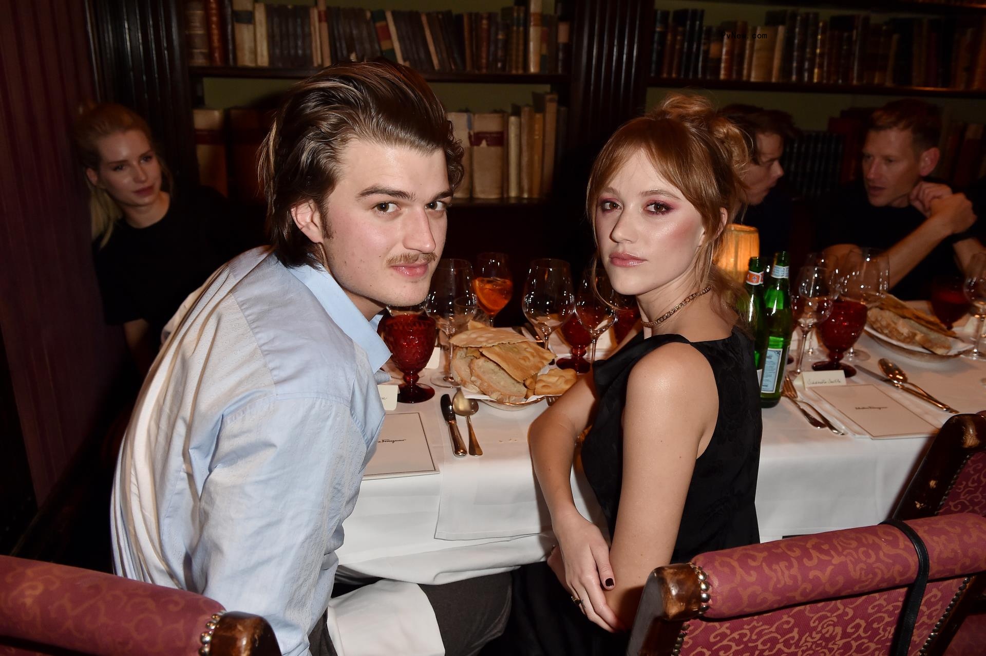 Joe Keery and Maika Mo<i></i>nroe sitting together