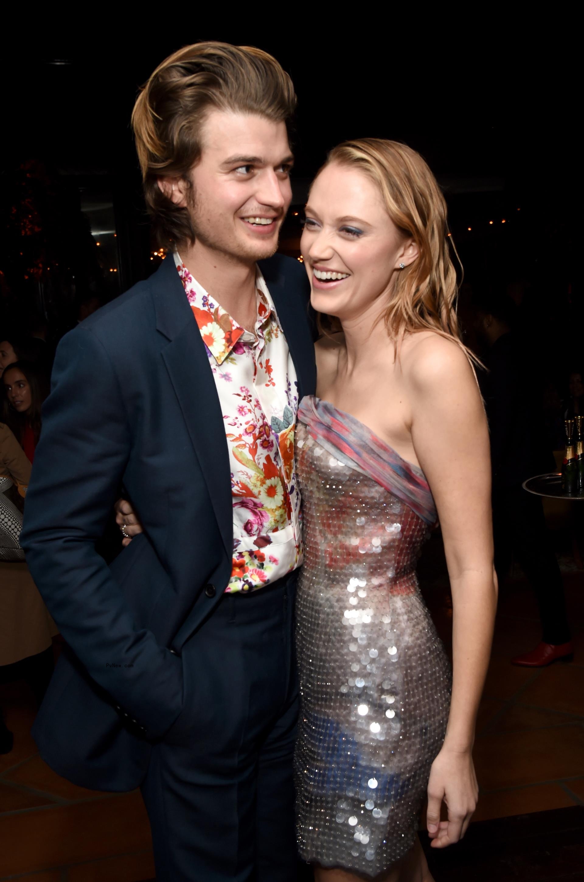 Joe Keery and Maika Mo<i></i>nroe posing together 