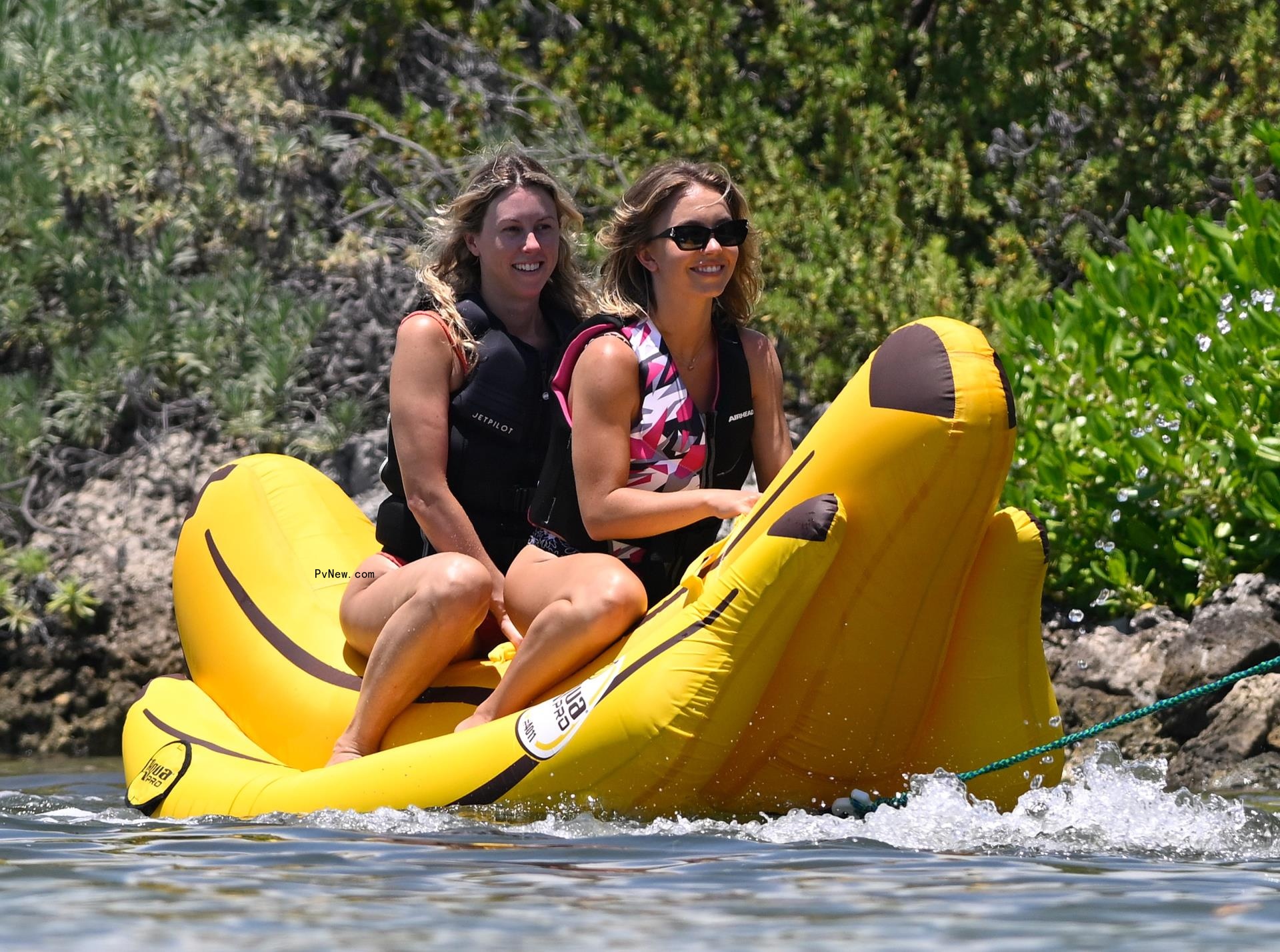 Sydney Sweeney and a friend on a banana boat.