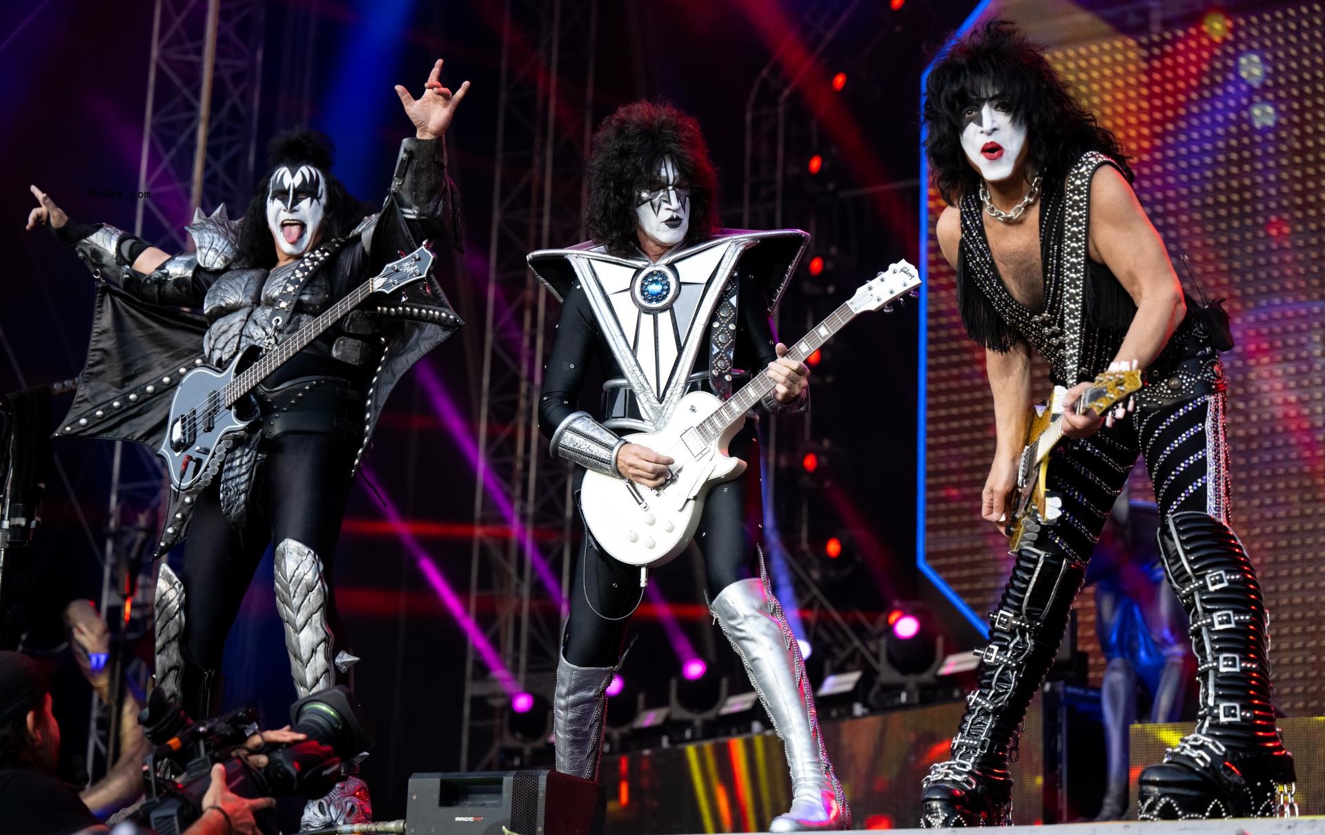 A photo of KISS performing on stage