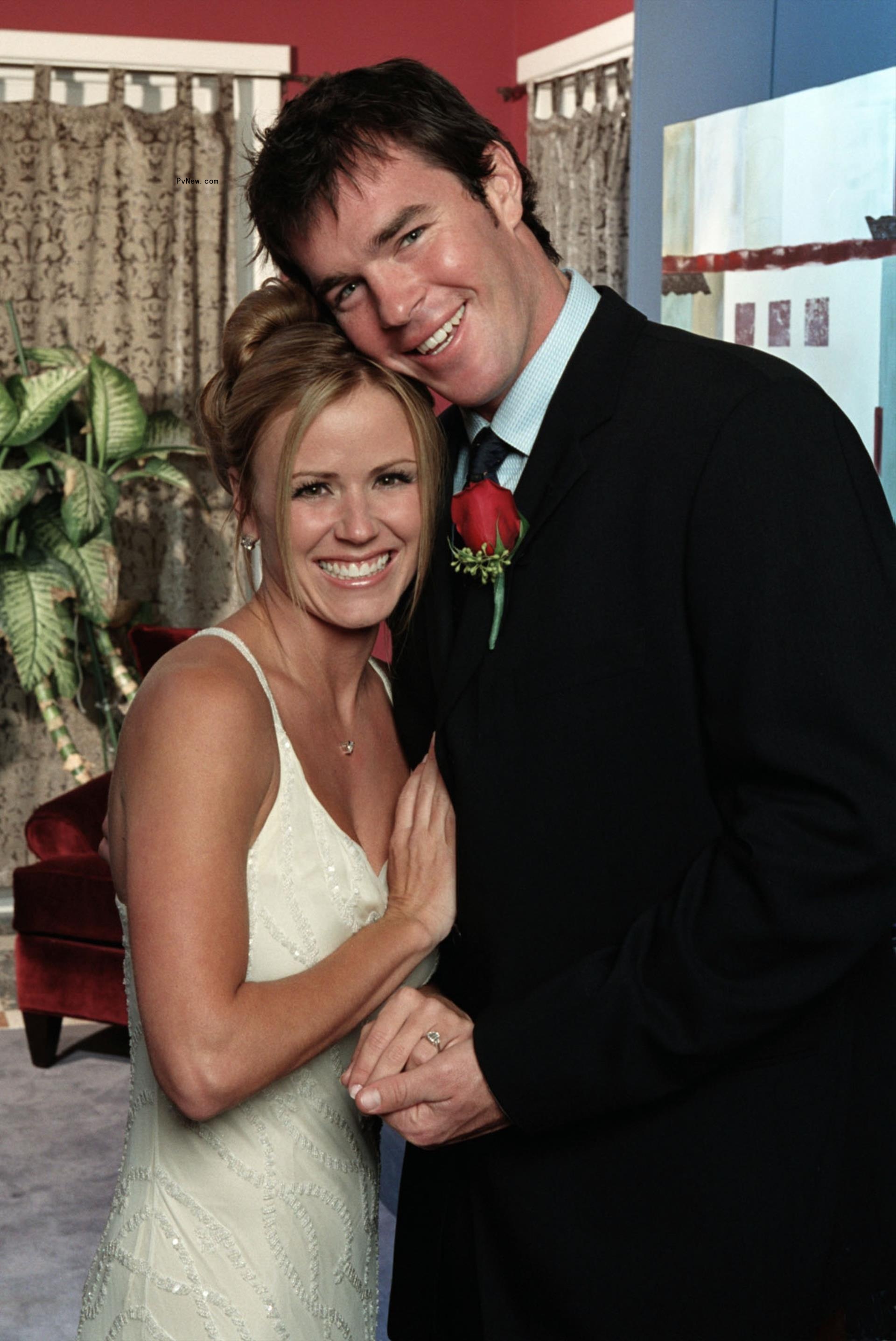 Trista Sutter and Ryan Sutter posing together on the